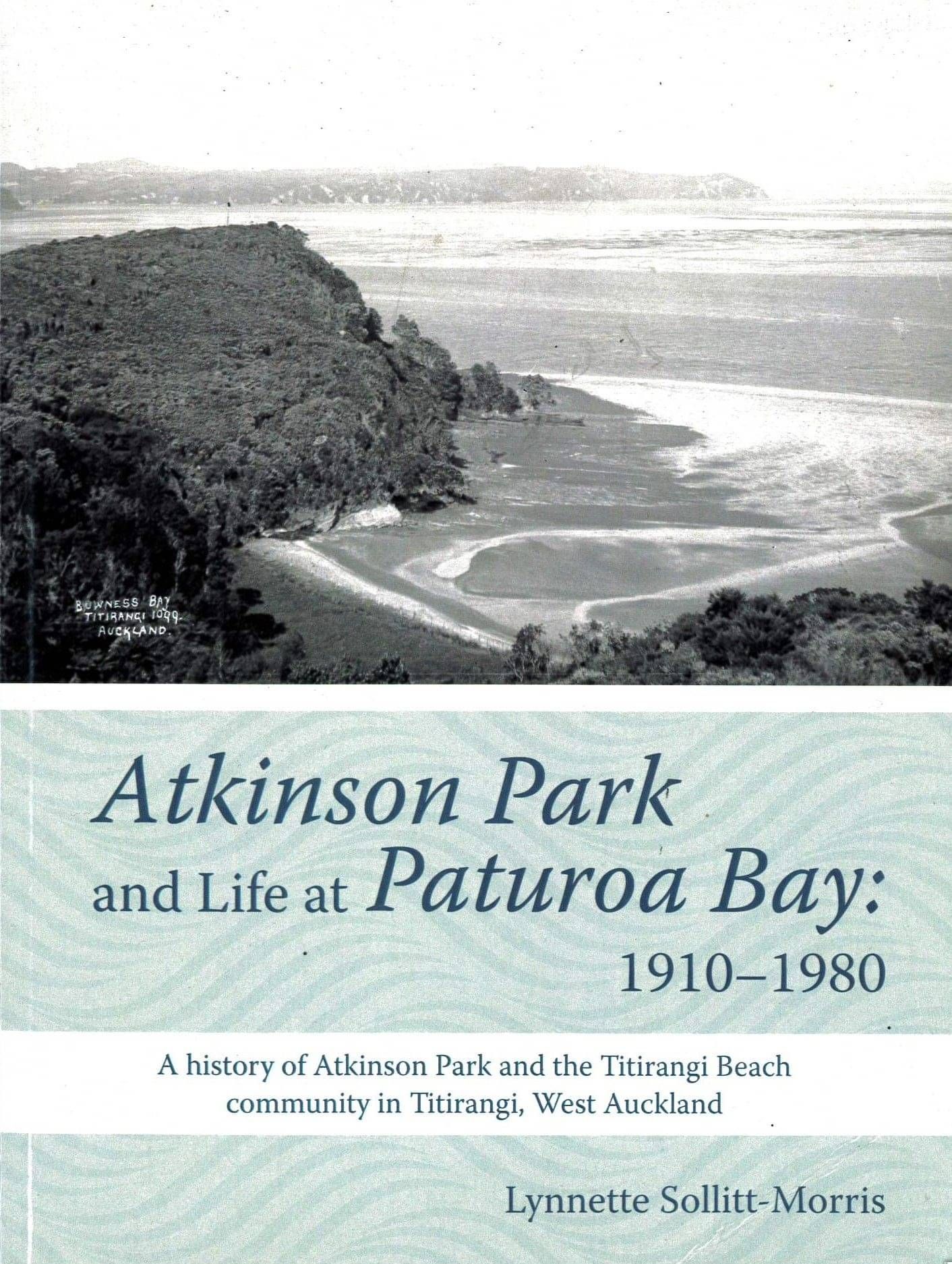Book cover with a black and white photo of hills and a secluded bay