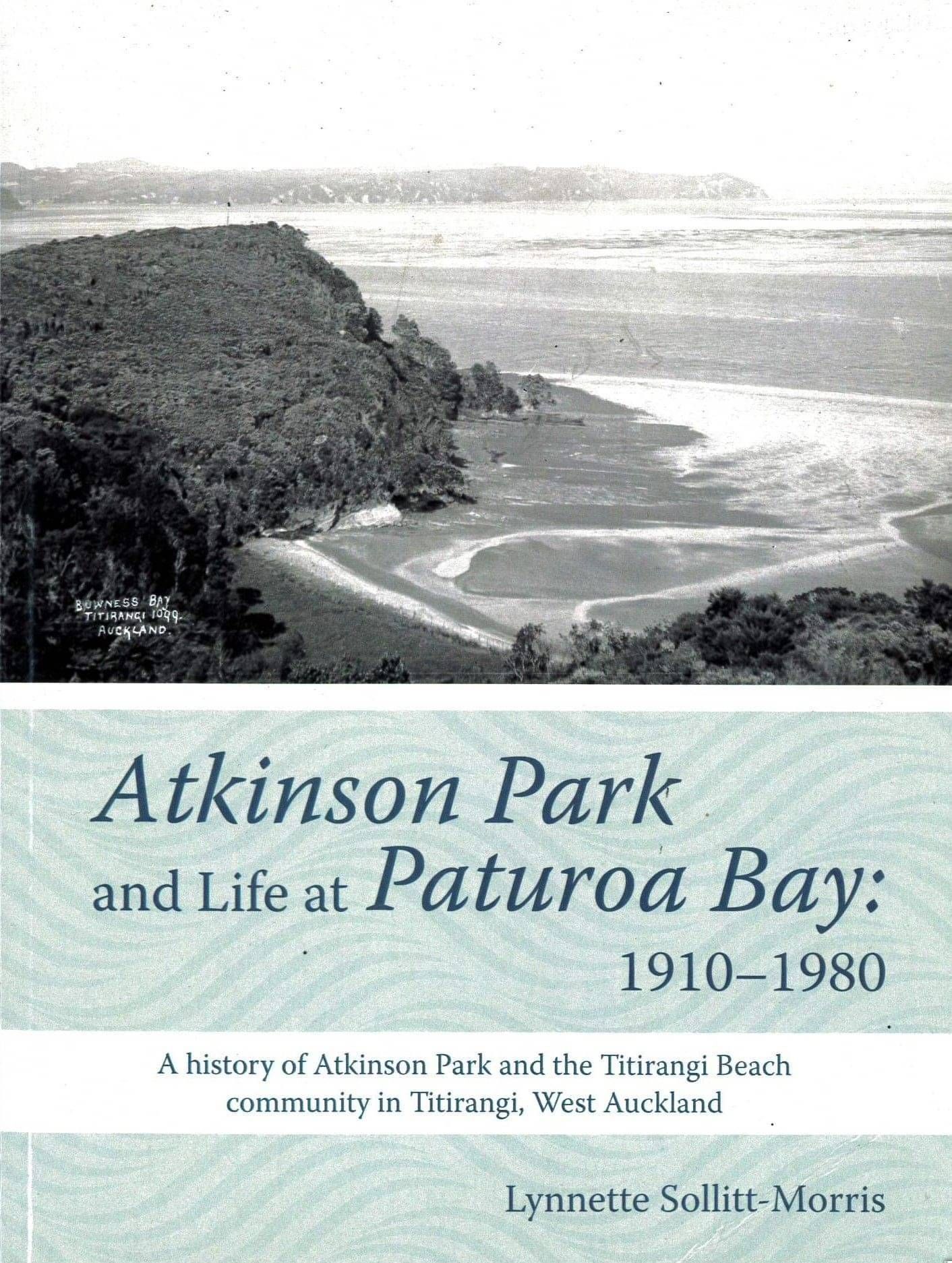 Book cover with a black and white photo of hills and a secluded bay