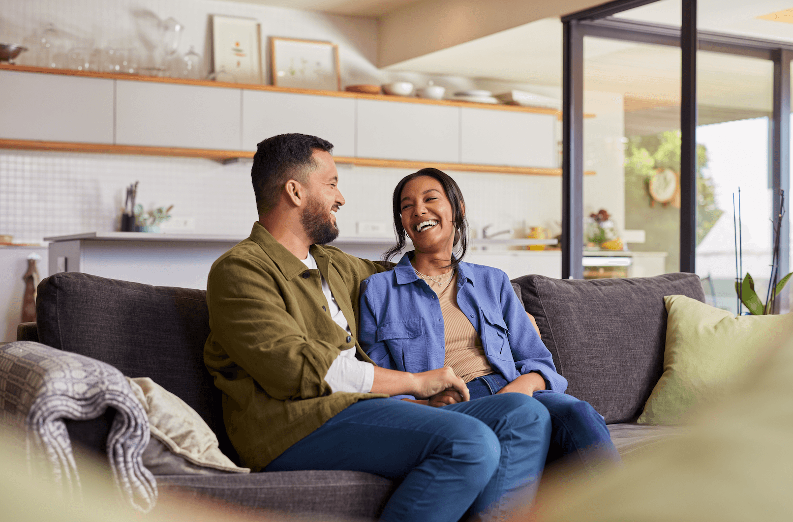 Happy, smiling couple on a couch