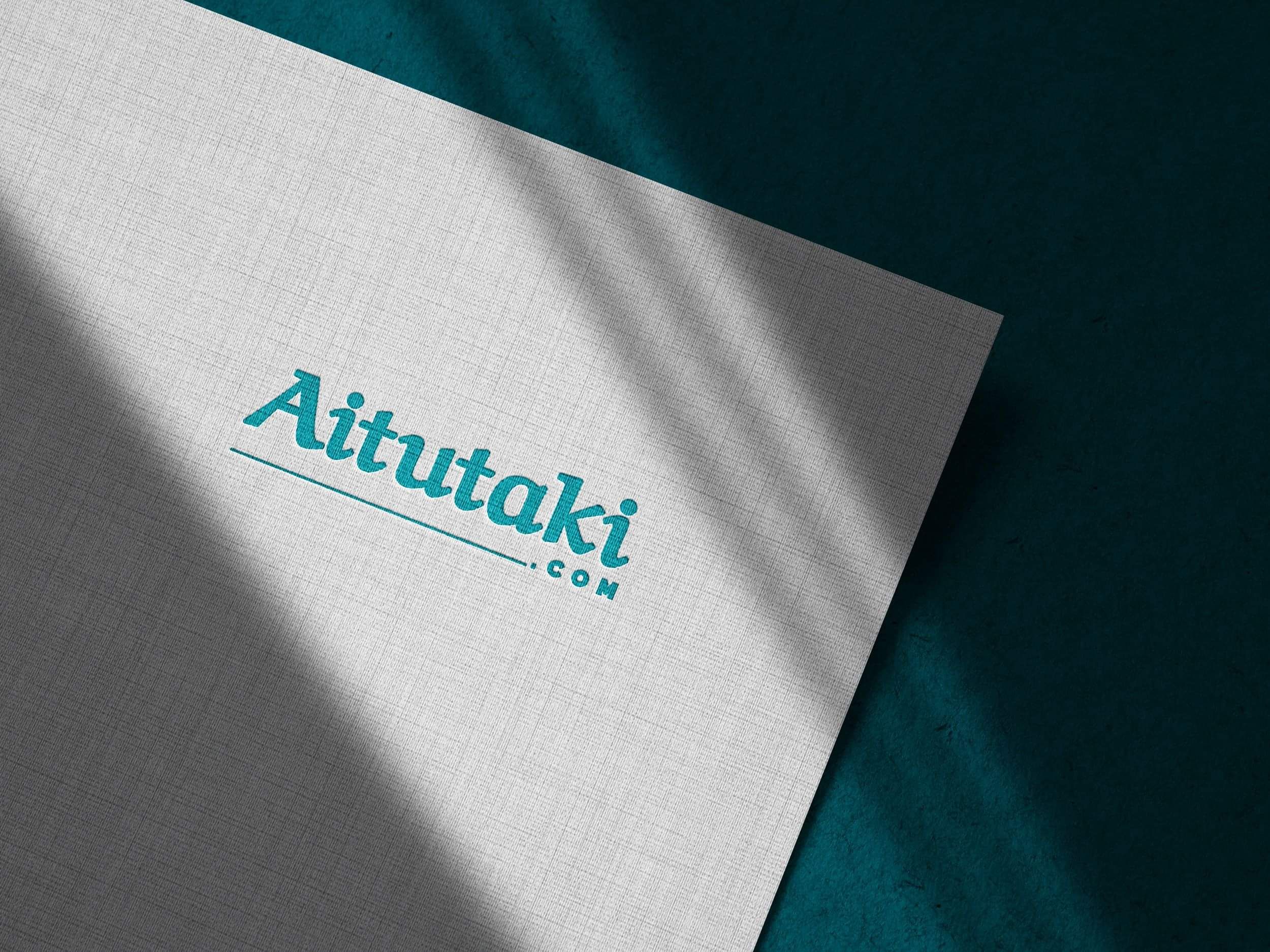 Aitutaki.com Logo on textured paper designed by Amy Brailey Poppyseed Design