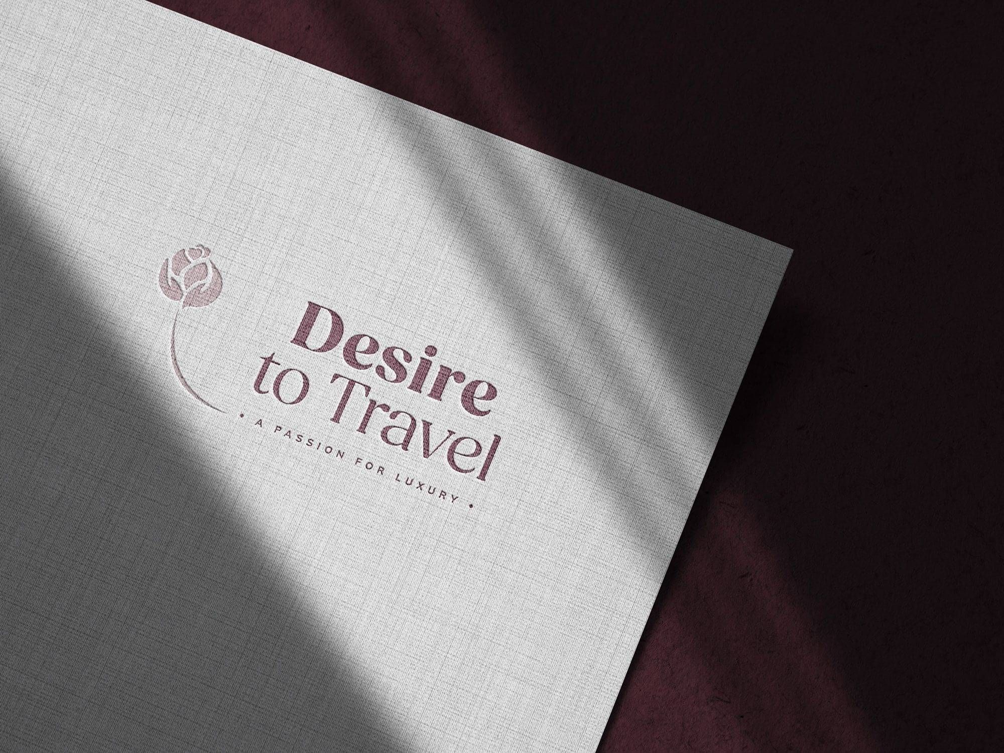 Desire To Travel Logo on textured paper designed by Amy Brailey Poppyseed Design