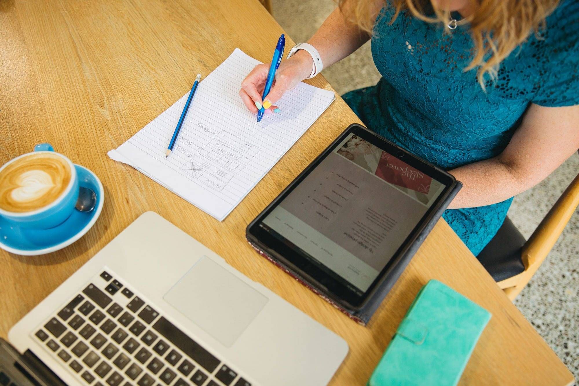 Wedding Brand Positioning guide shown on a desk - with questions to answer