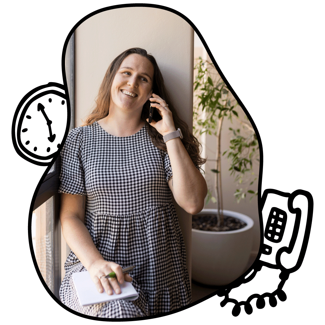 Admin Anna on the phone to a client