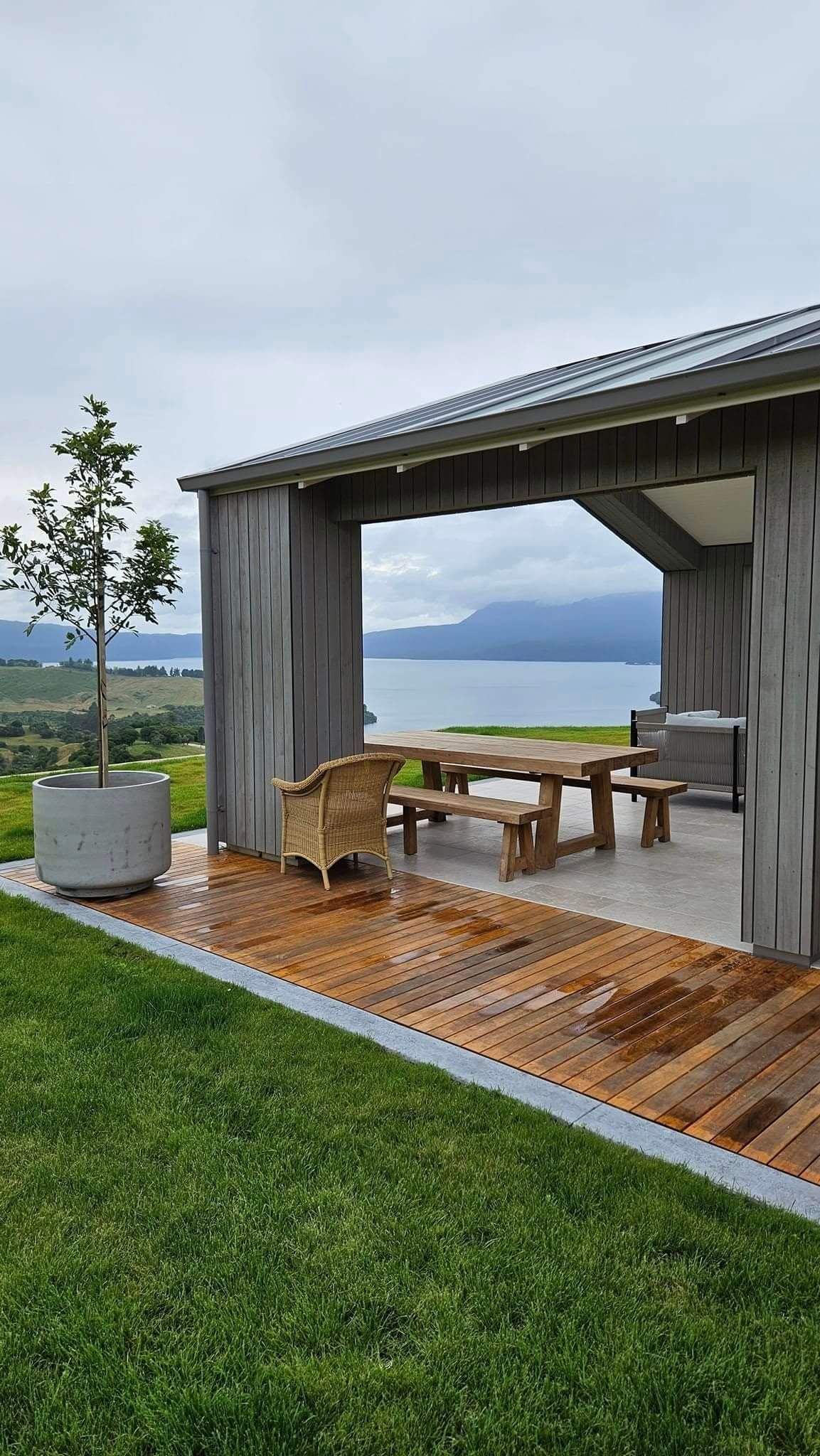 Landscape outdoor living design in Rotorua with pool and deck area for sunning