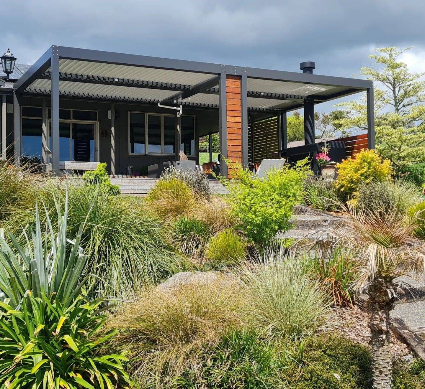 Pacific Lourve roof system provide shade, airflow and all weather protection
