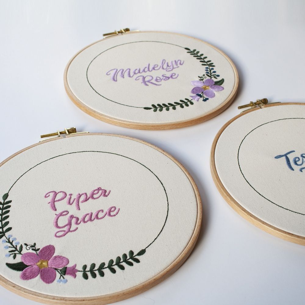 Embroidered hoops with floral design and girls names