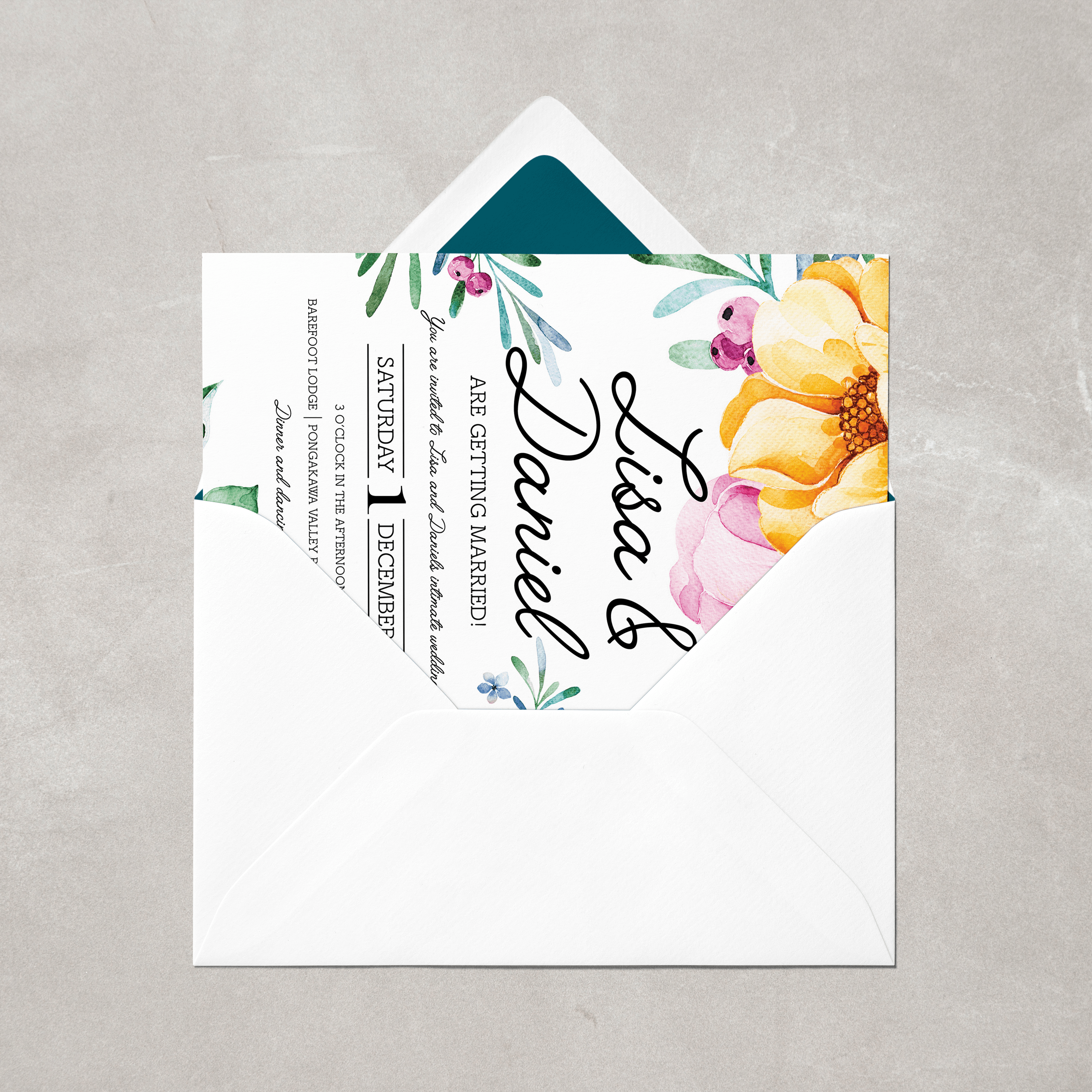 Wedding invitation in envelop featuring floral design