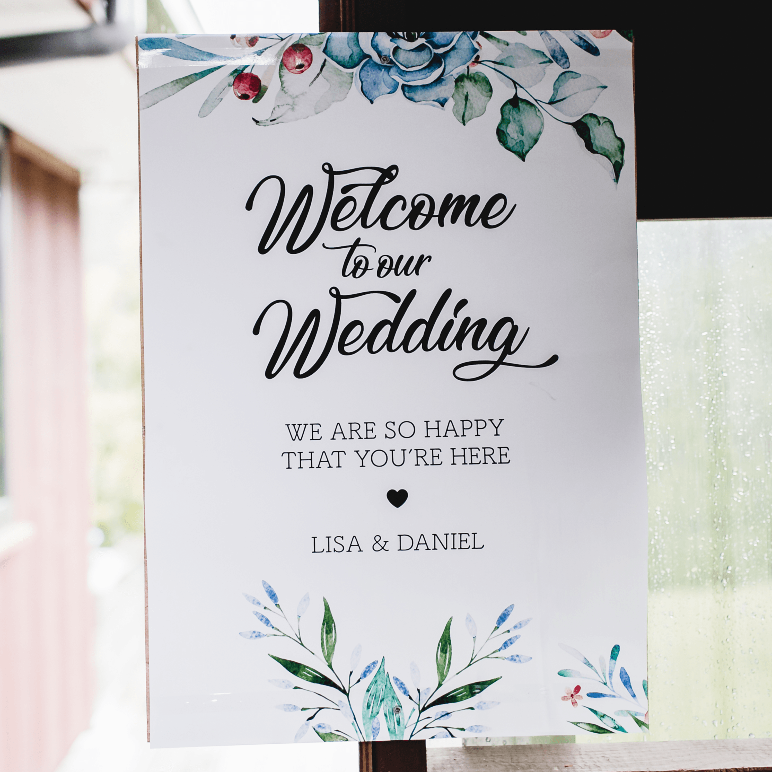 Wedding welcome sign featuring floral design