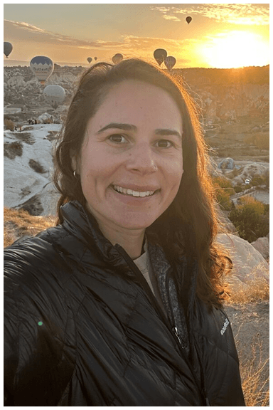 Photo of Laura Squires, travel guide and occupational therapist, smiling.
