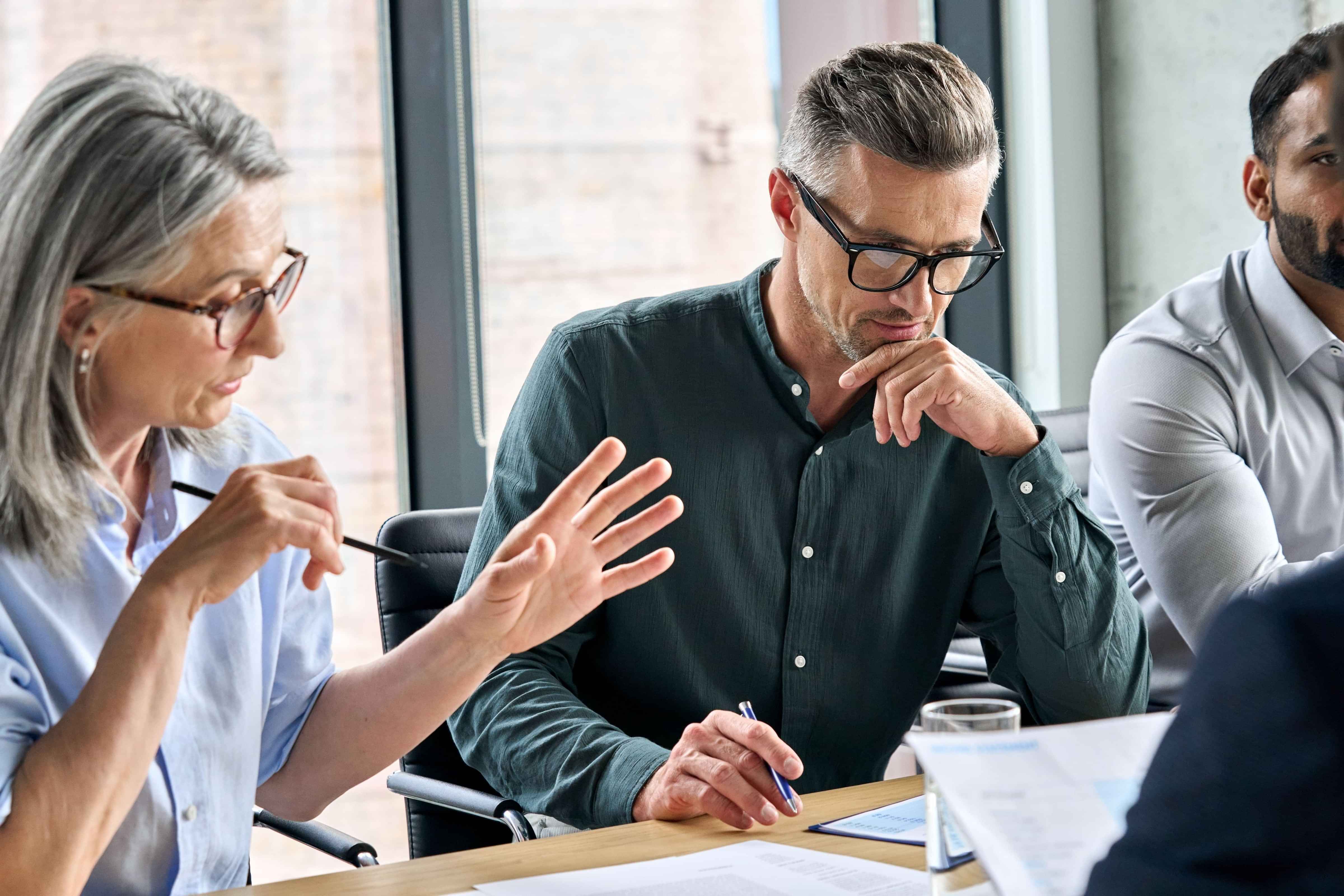 Business people discussing work