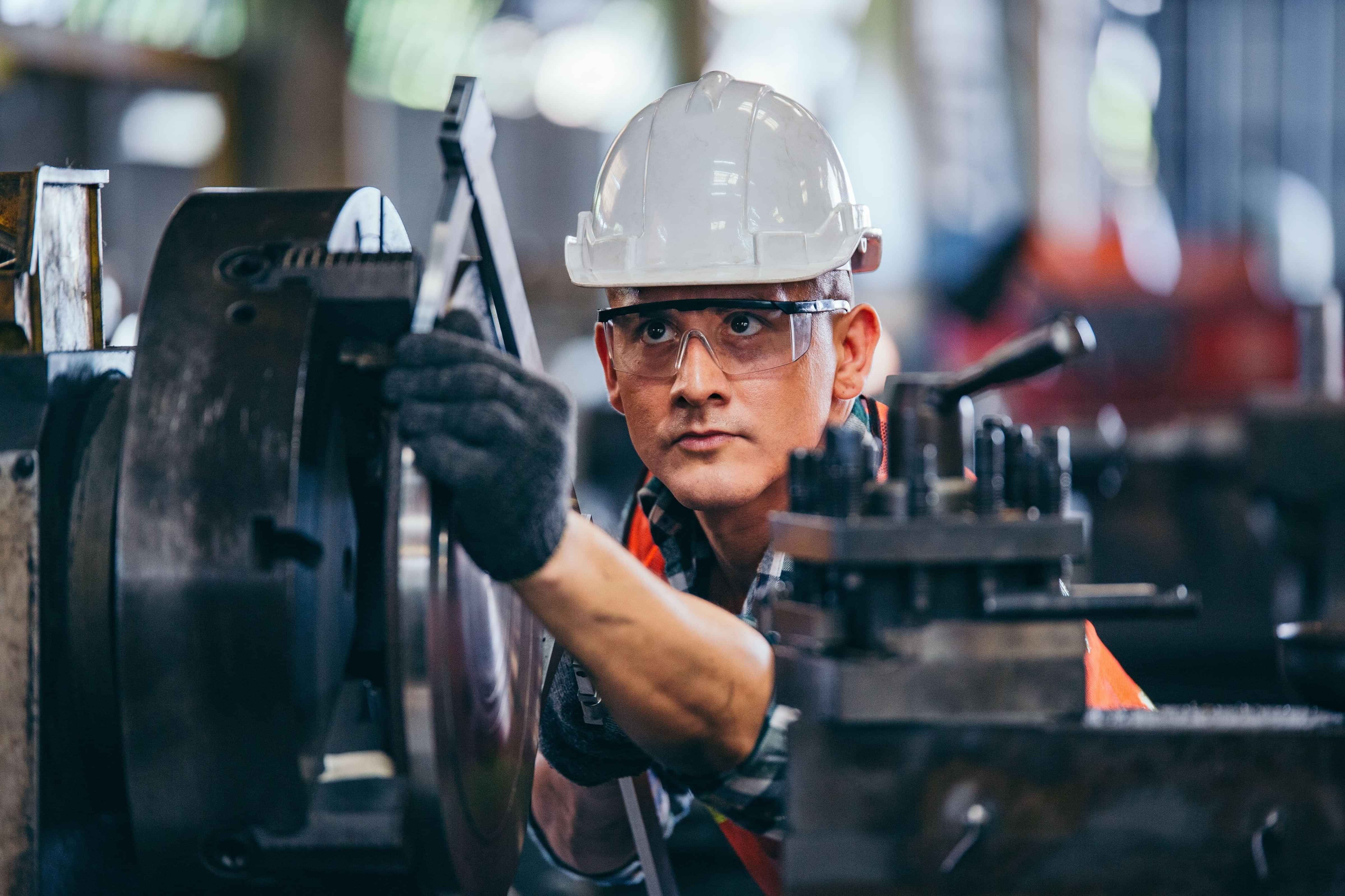 Engineer looking at a part