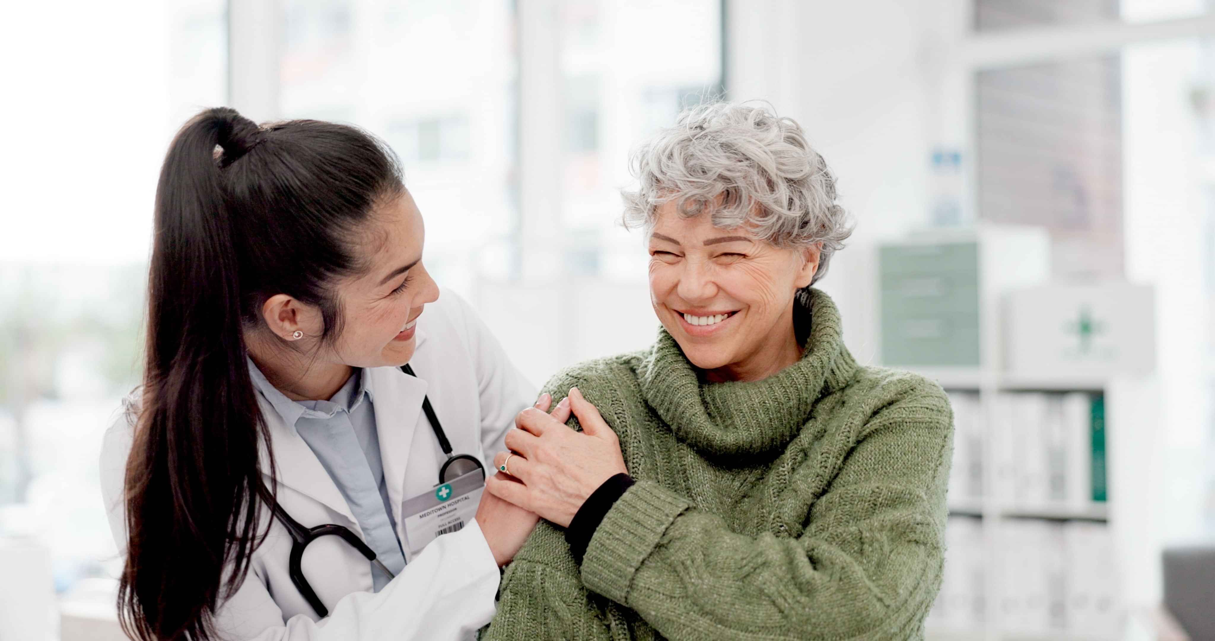 Doctor with women smiling