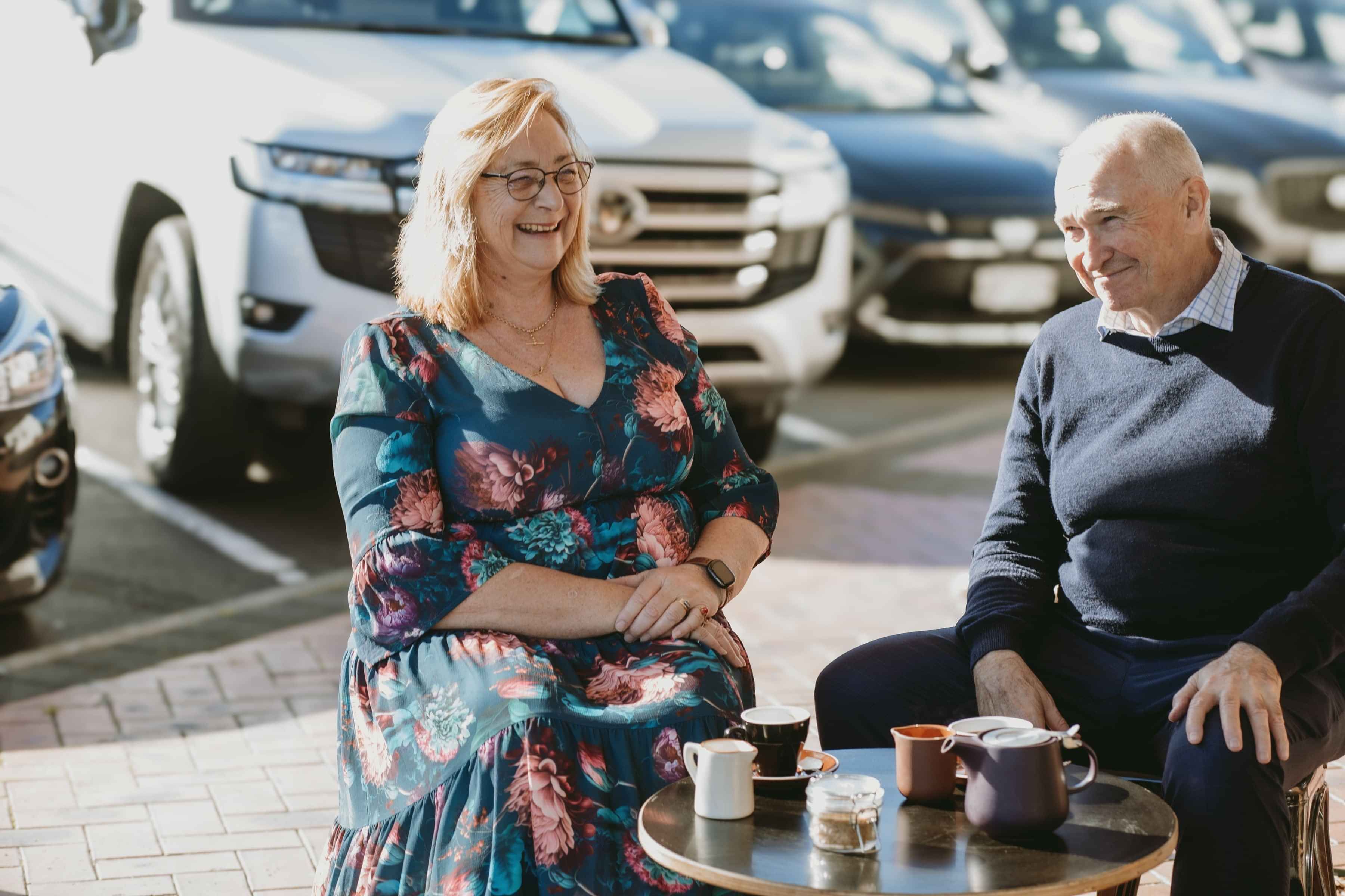 Karen and Andre Tourelle having coffee