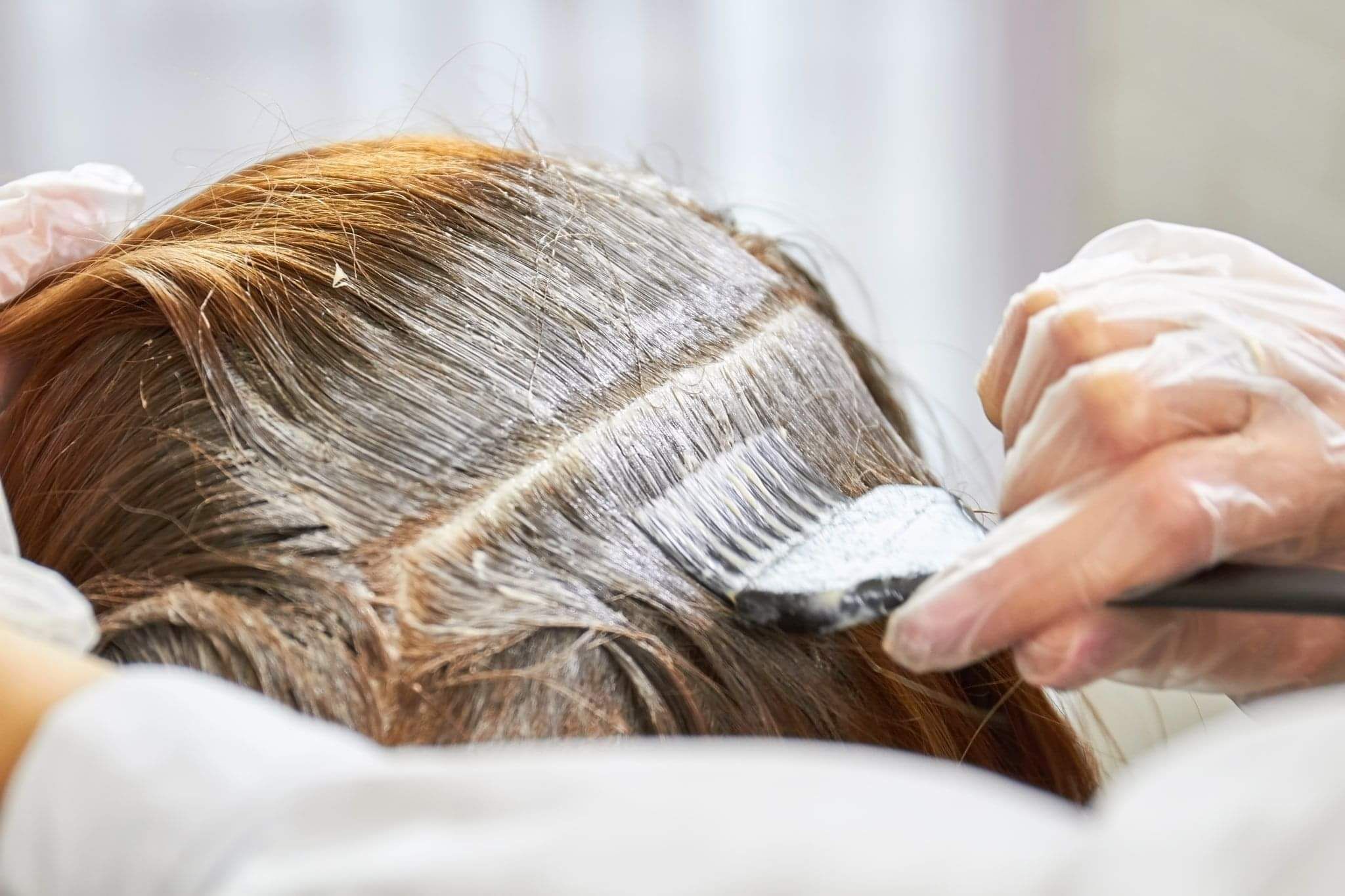 Hair dye being applied to clients hair