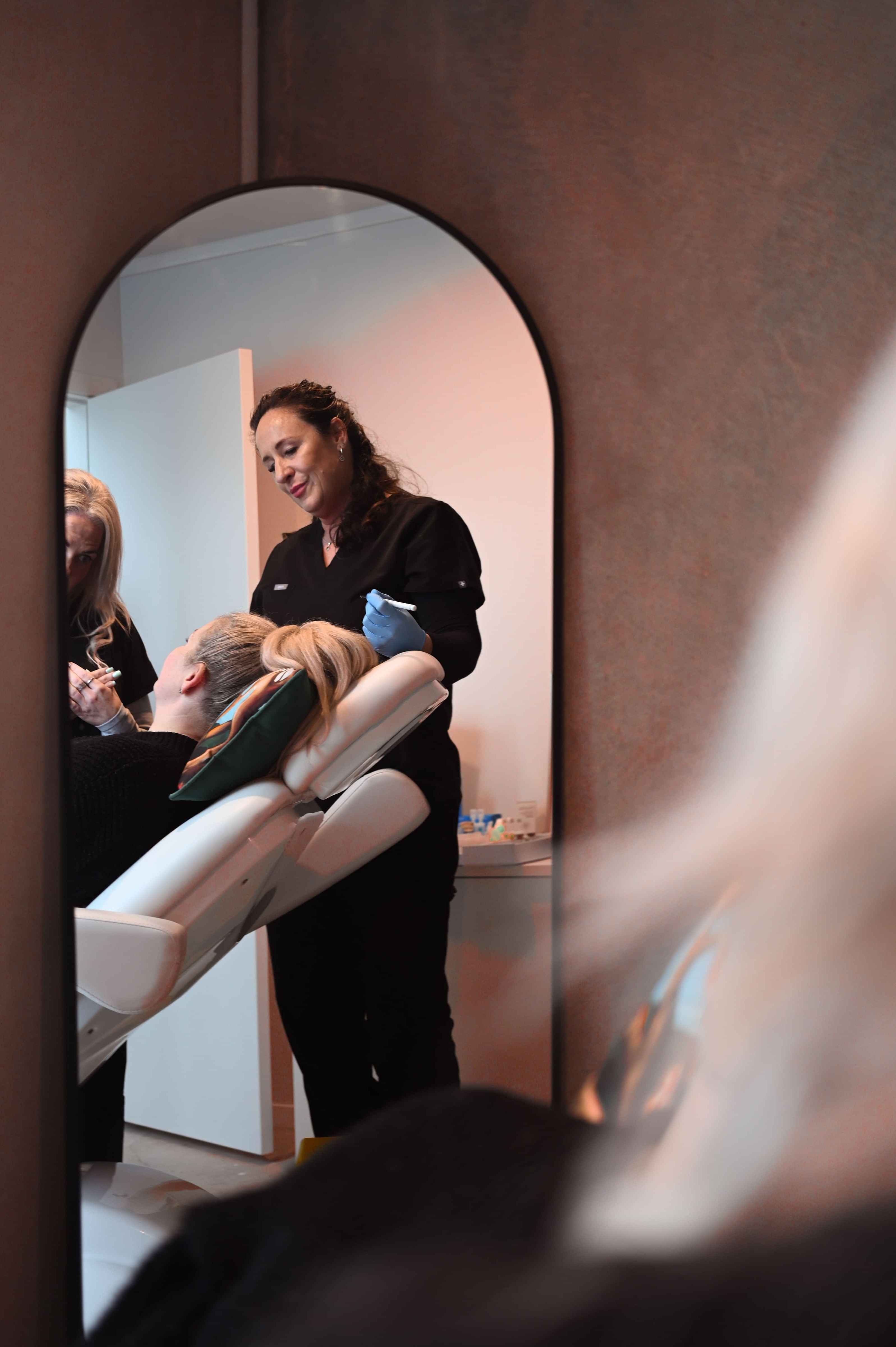 Photo of Kylie Dillon offering a client consultation