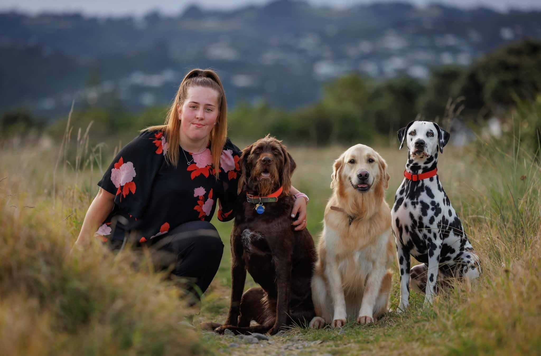 Dog trainer Abi and her springer spaniel dog