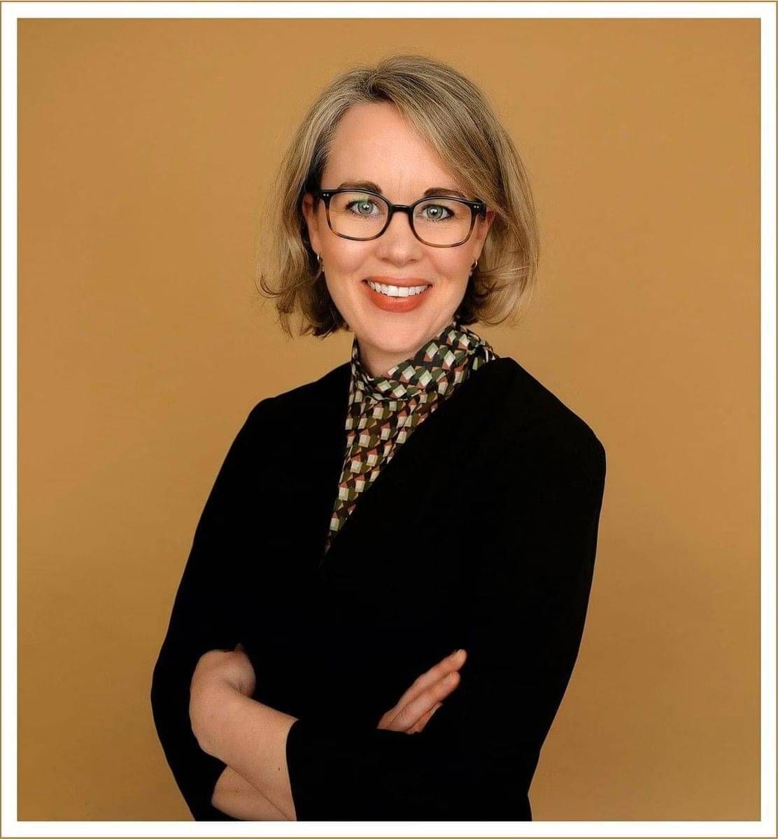 Louisa Jackson, family law barrister, standing in a relaxed professional pose