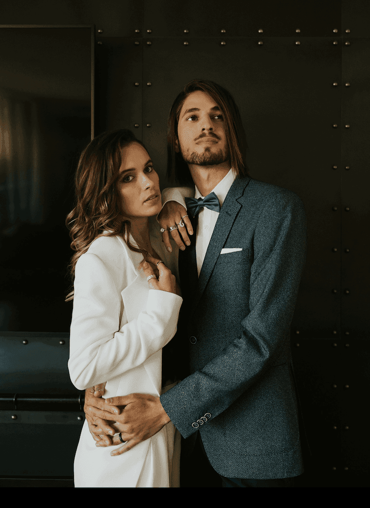 An editorial image of a couple embracing. Hair styled by Georgie.