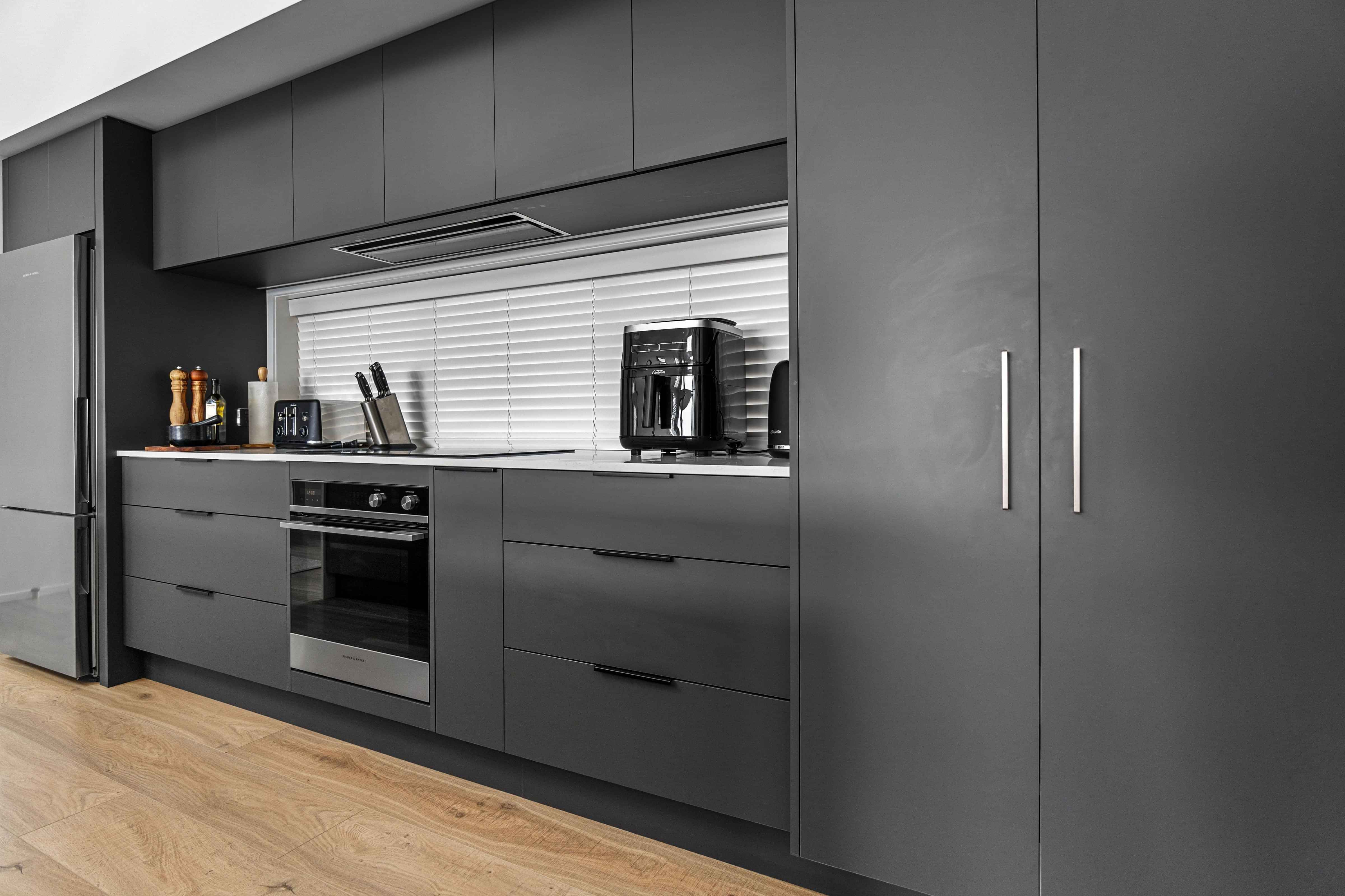 Open-plan kitchen and dining in Rangatahi award winning house