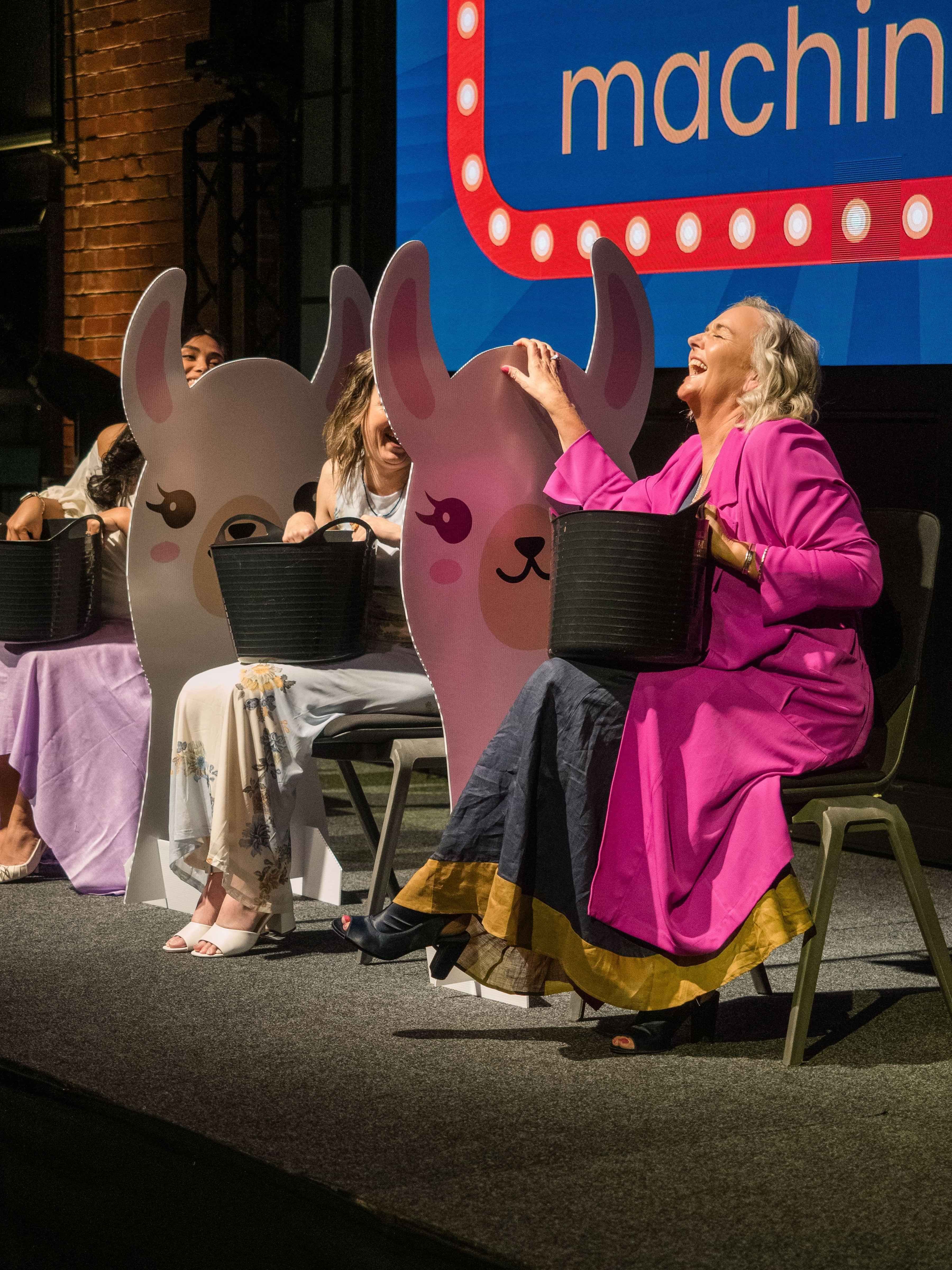 Event photograph of women laughing at Virtual Assistant Awards event in Hamilton, New Zealand.