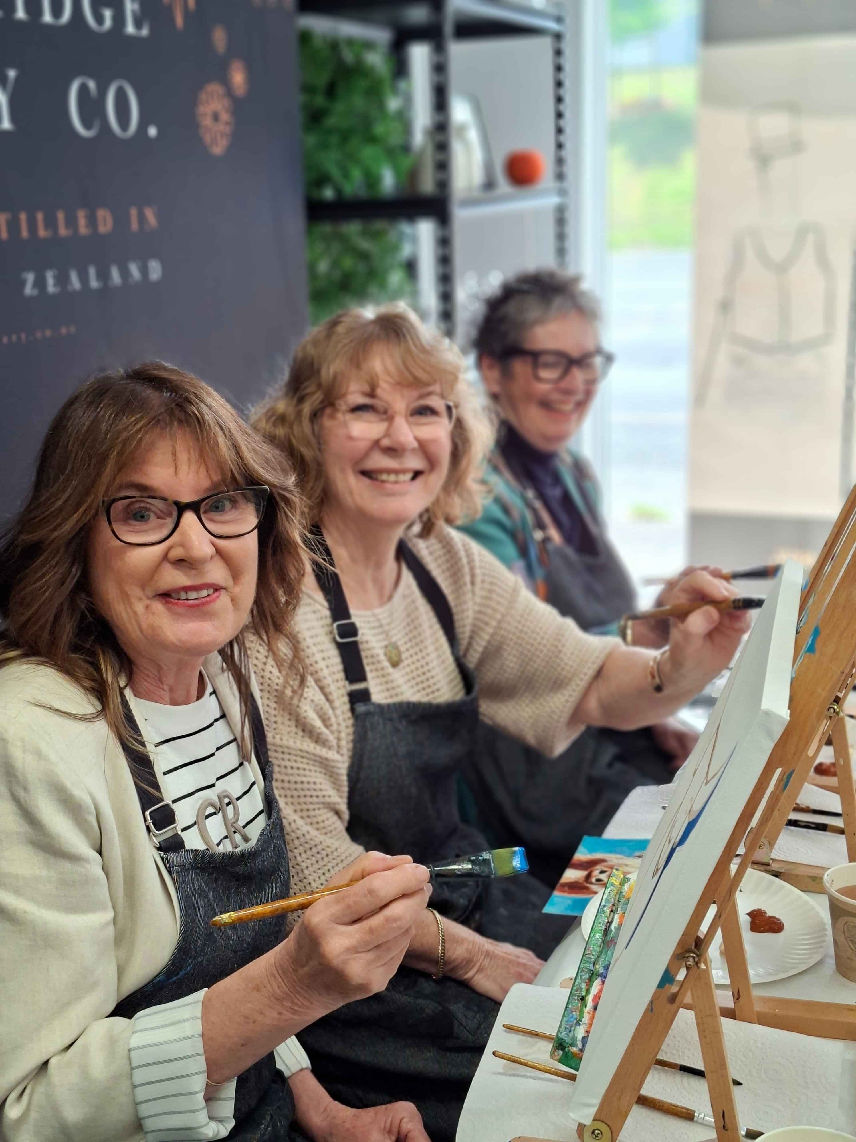 Scenic view from the lake shore watching a steamboat depart. Flowers in the foreground.