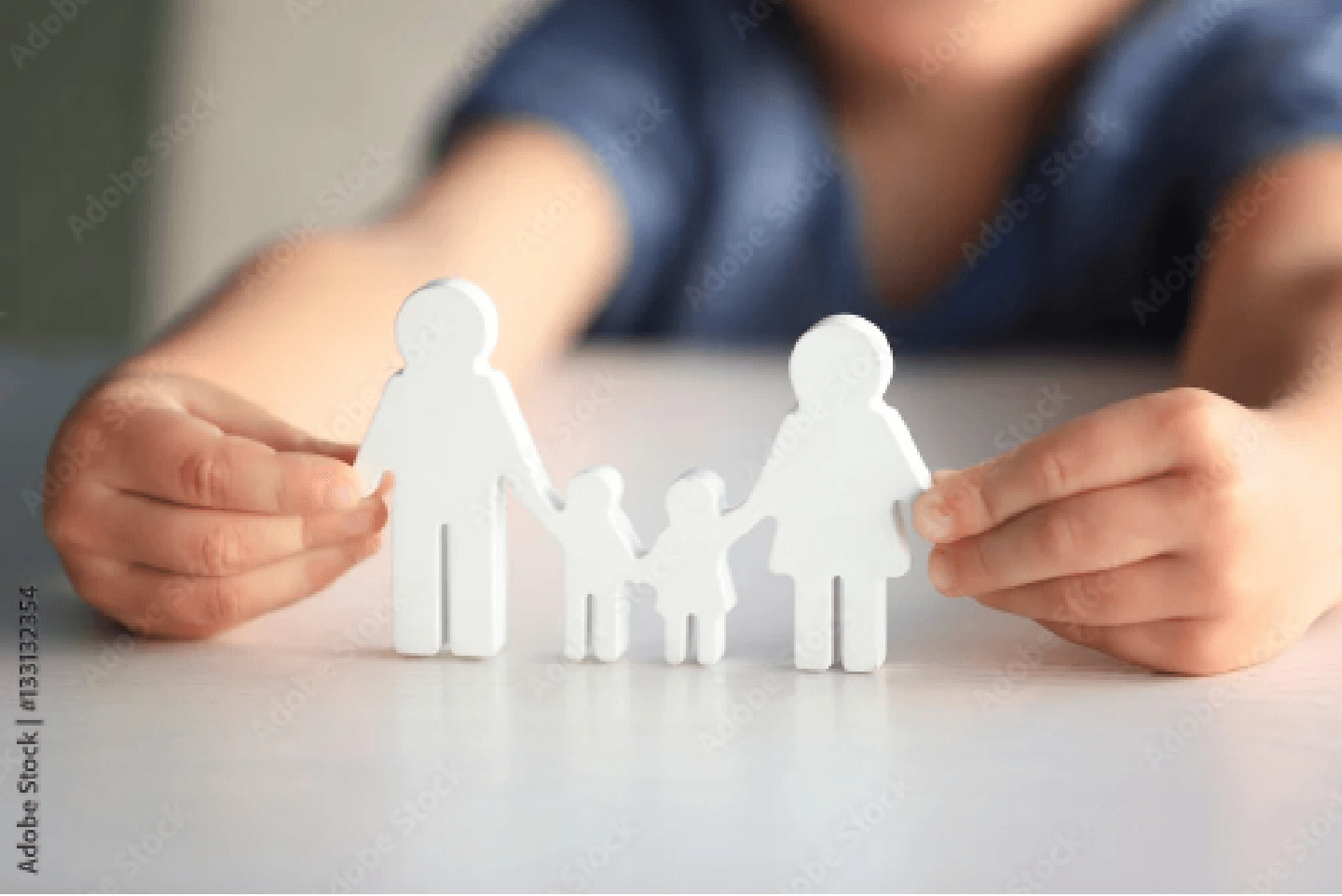 Paper cutout family held by child, representing collaborative law as an alternative to court