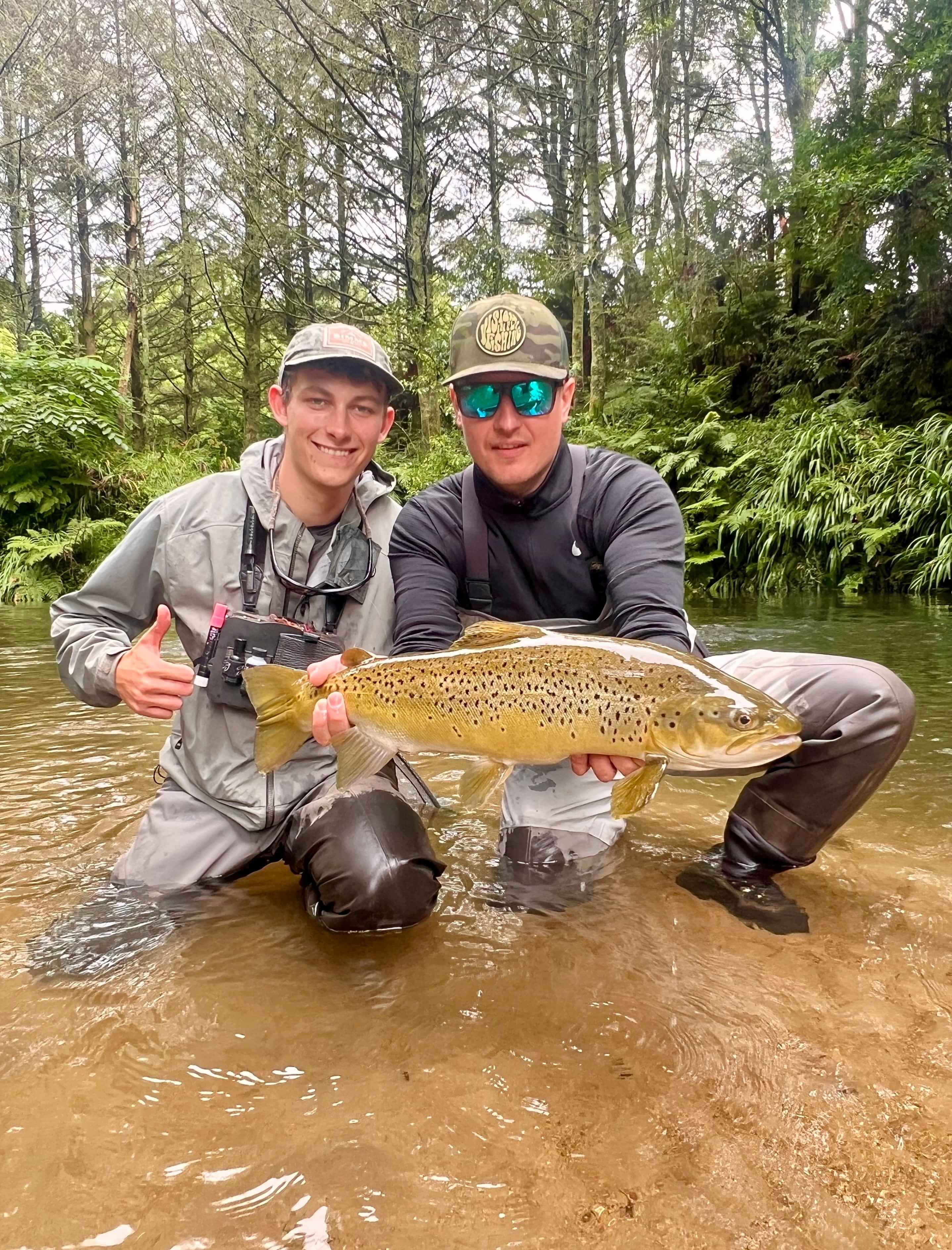 Ollie Bassett Fly Fishing Client with huge Rotorua brown trout fishing