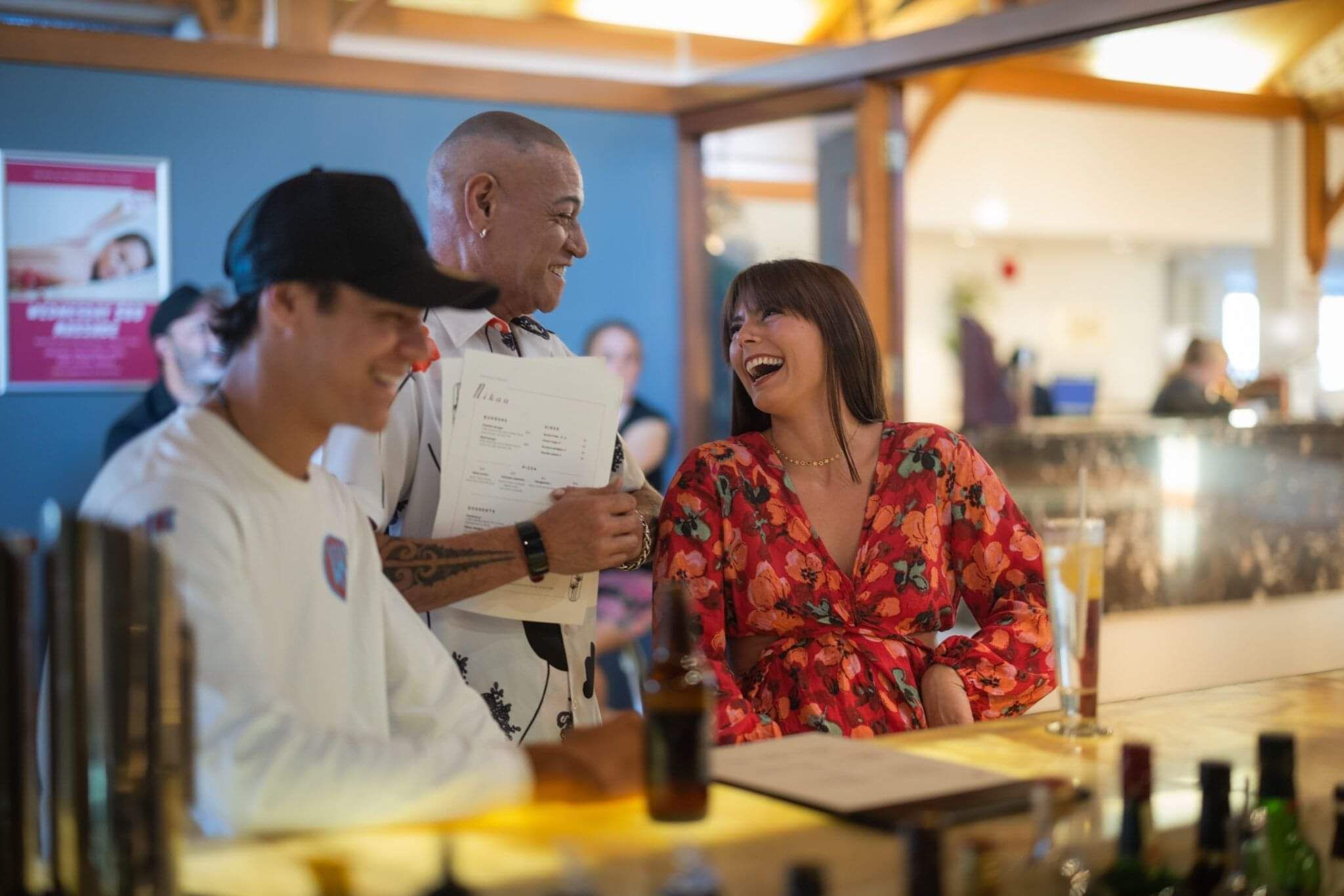 Dining at Millennium Hotel Rotorua - lady laughing with the waiter