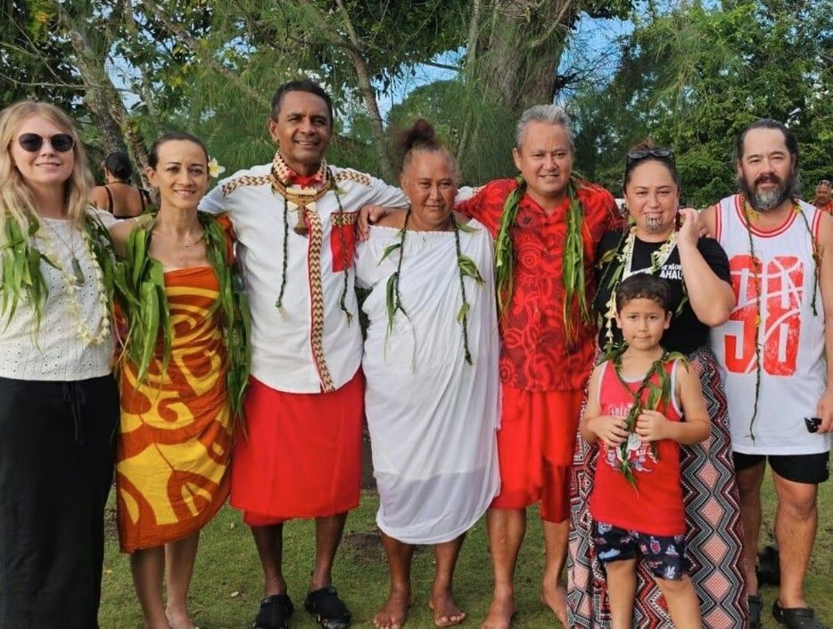 Group of participants standing in a workshop facilitated by AraHina for Foodstuffs’ Te Uru Kahikatea Māori Network.