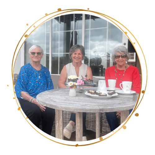 Senior women smiling, receiving supportive social engagement