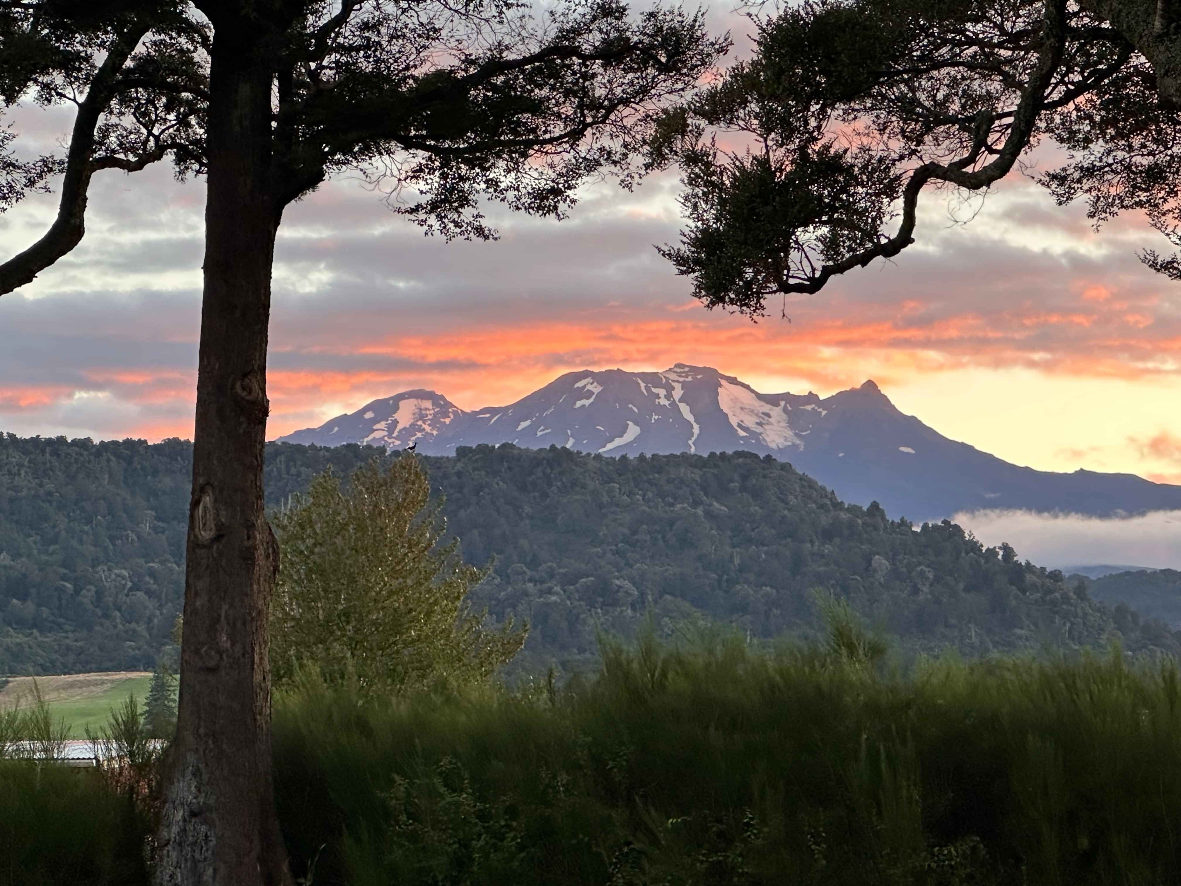 Sunset over Mt Ruapehu, as seen from the spa in the Mangawhero Suite