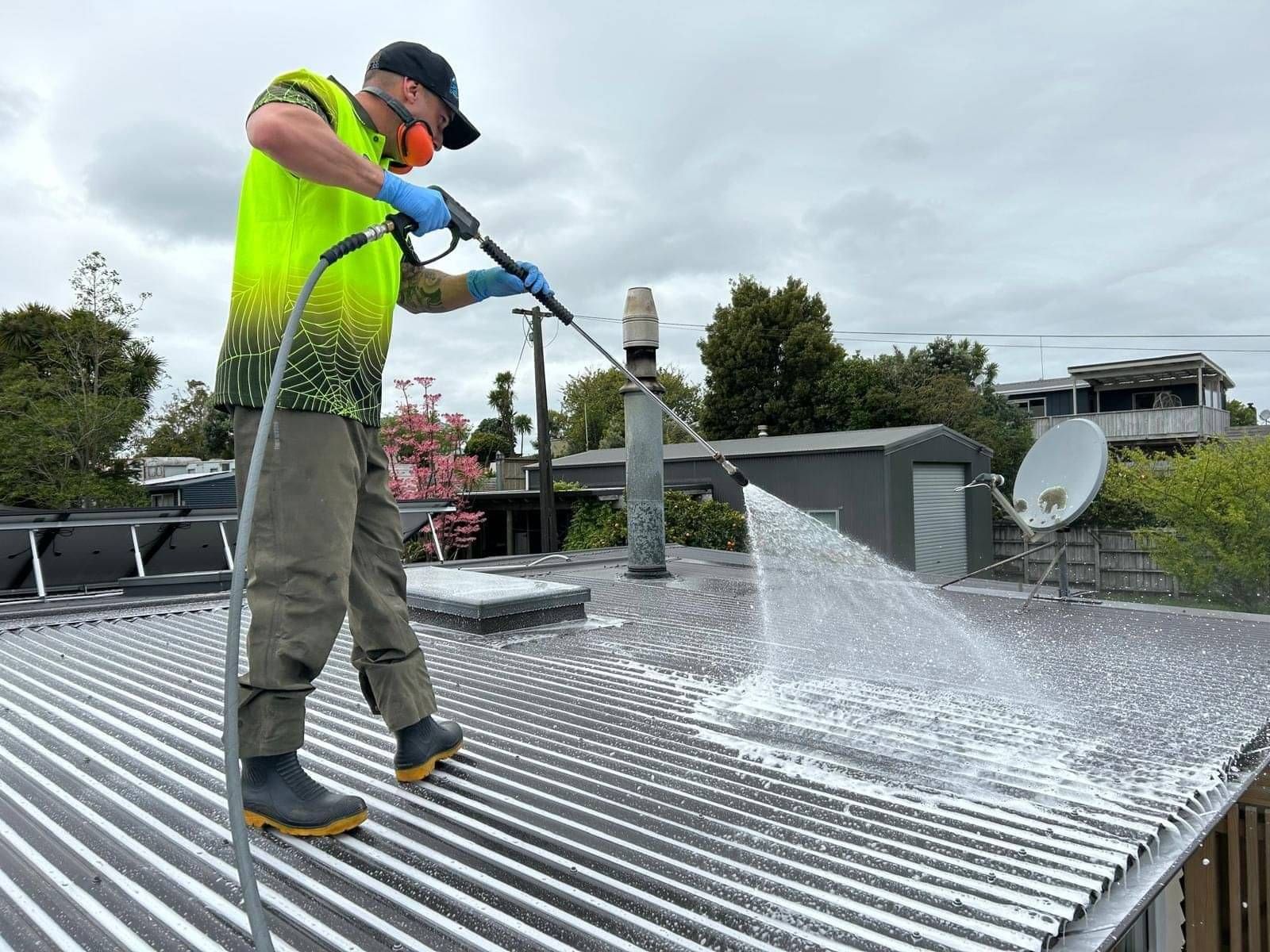 Photo of Aqua Force waterblasting roof of hamilton home