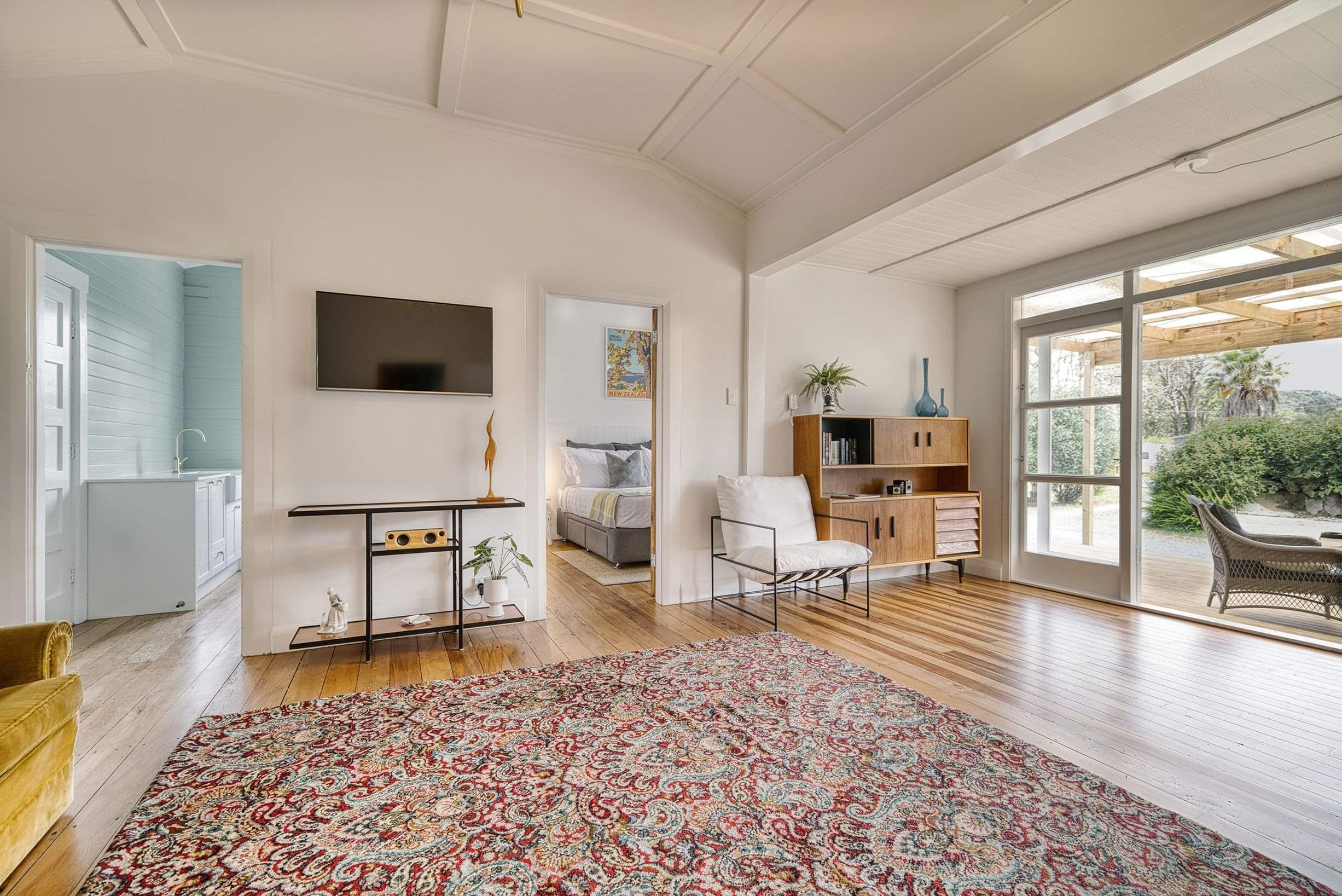 The Bach in Mangawhai Lounge Living Area Looking out to Deck