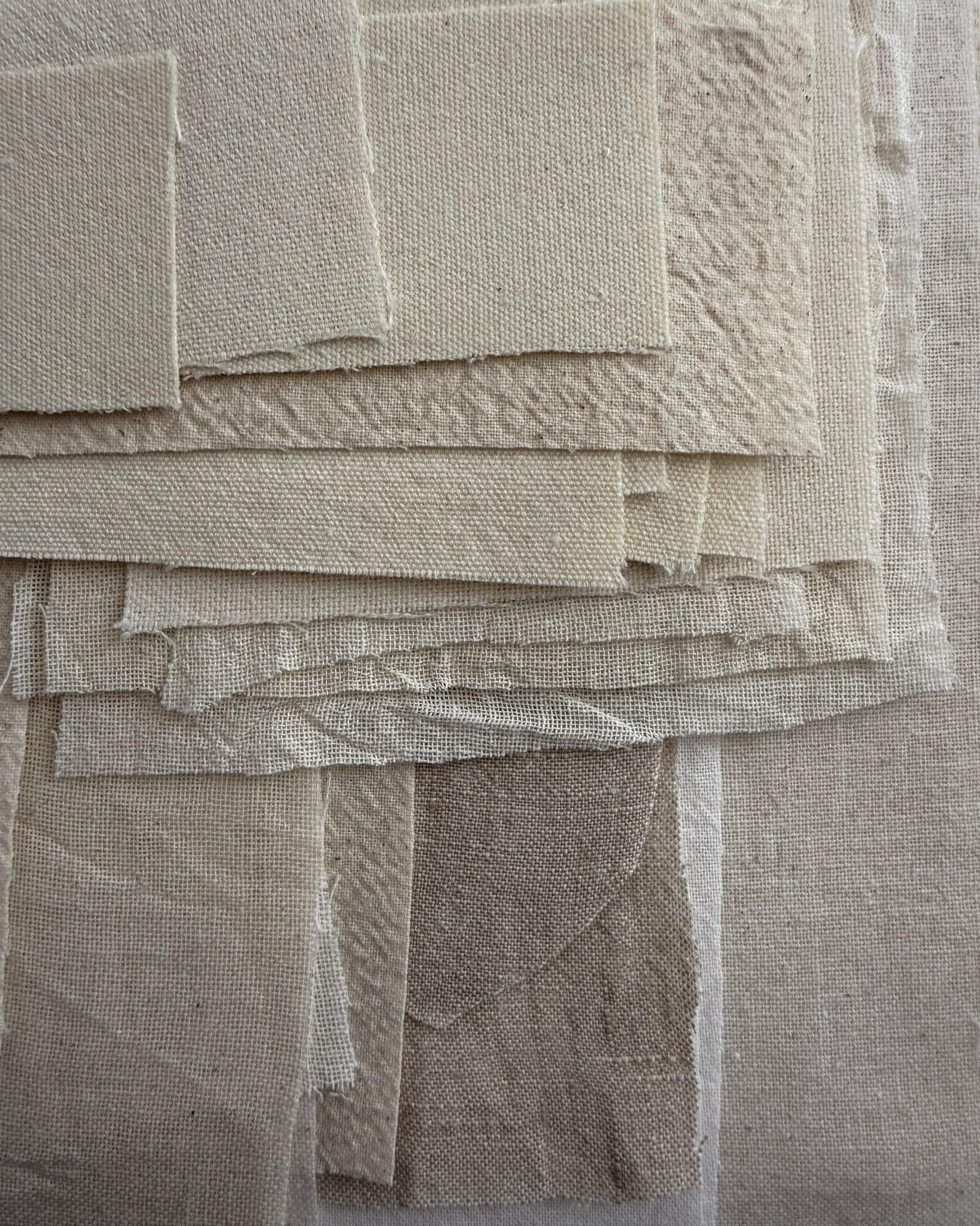 image of layered neutral-toned fragments of repurposed linen and cotton