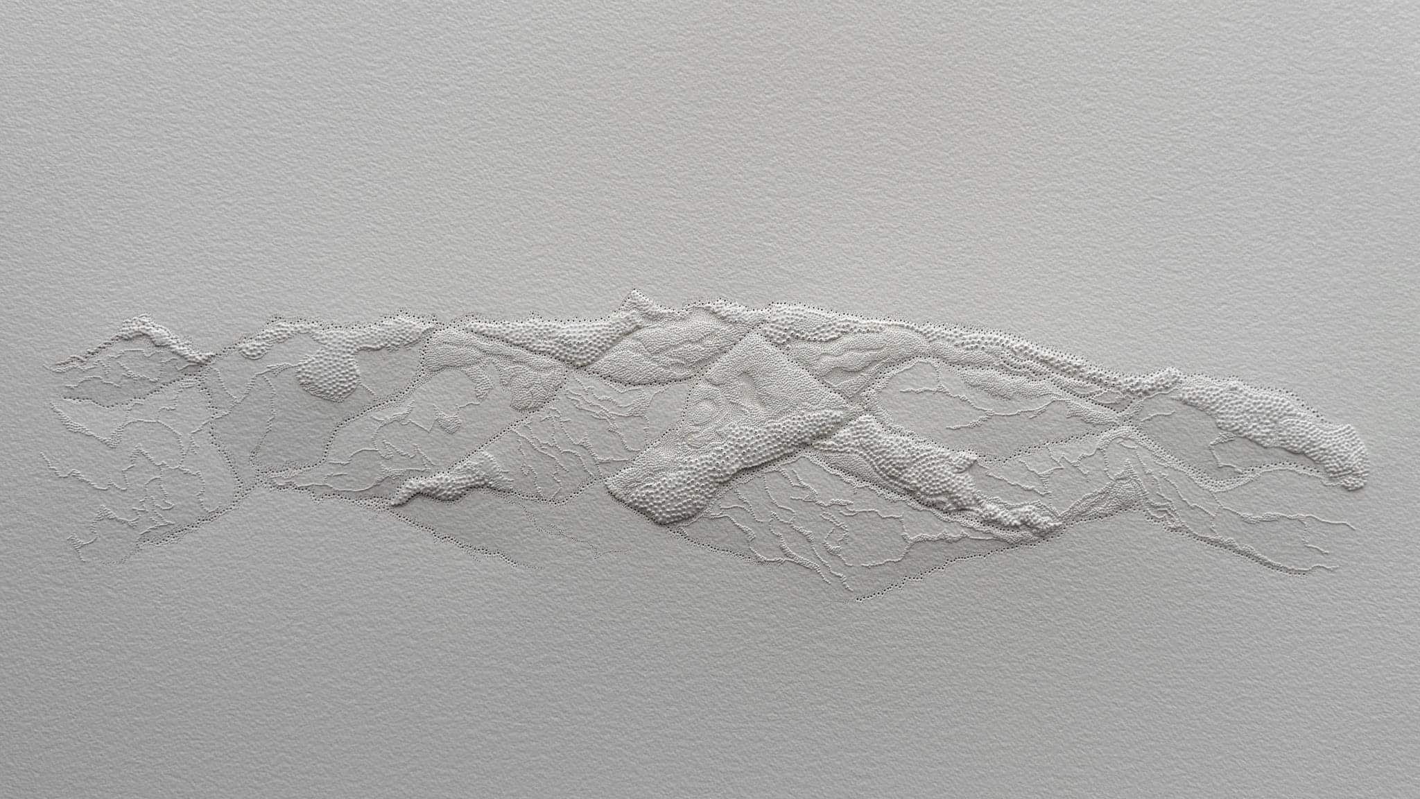 image of bas-relief on arches fine art paper with closely needled holes forming raised texture and contours 