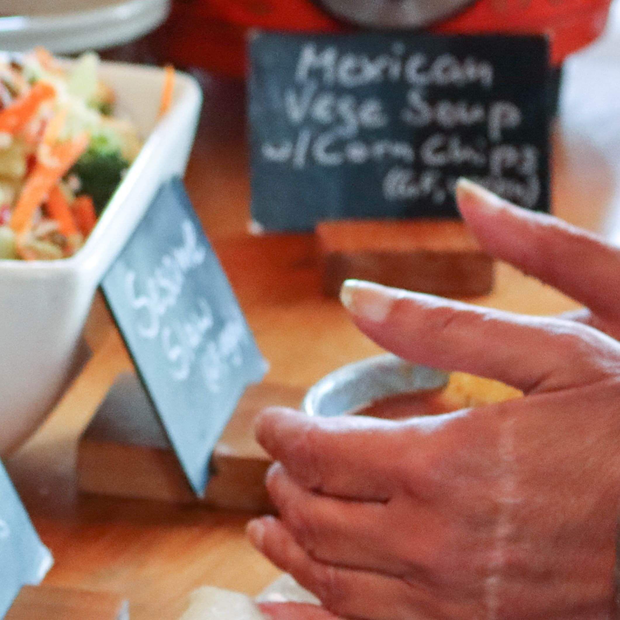 Pito One Koha Cafe closeup of hands