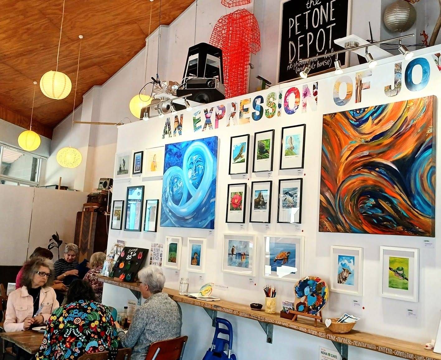 Pito One Koha Cafe spacer, featuring art on walls