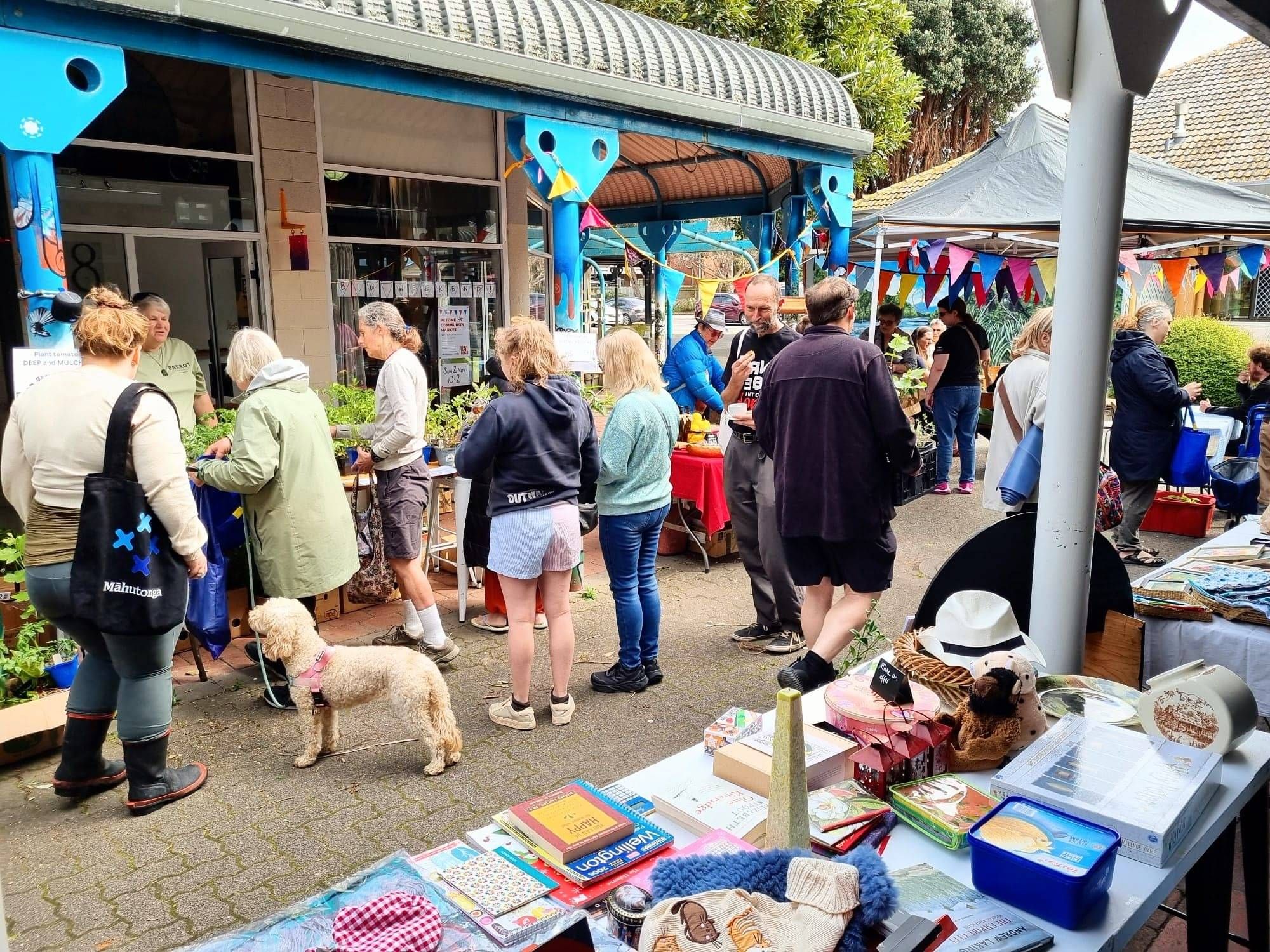 People lookingf at stuff at the Spring Market fundraiser outside the Pito One Depot