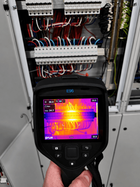 Using a thermal camera to inspect a commercial switchboard
