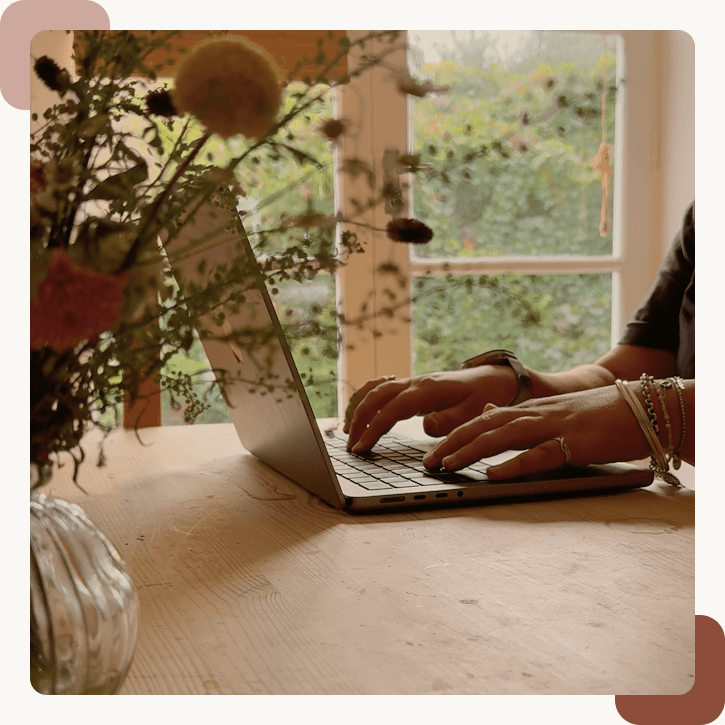 UX and Website Designer CathFr working on a laptop