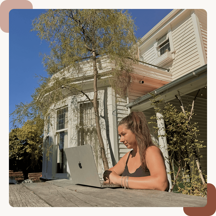 UX and Website Designer Catherine Frankum working on a laptop