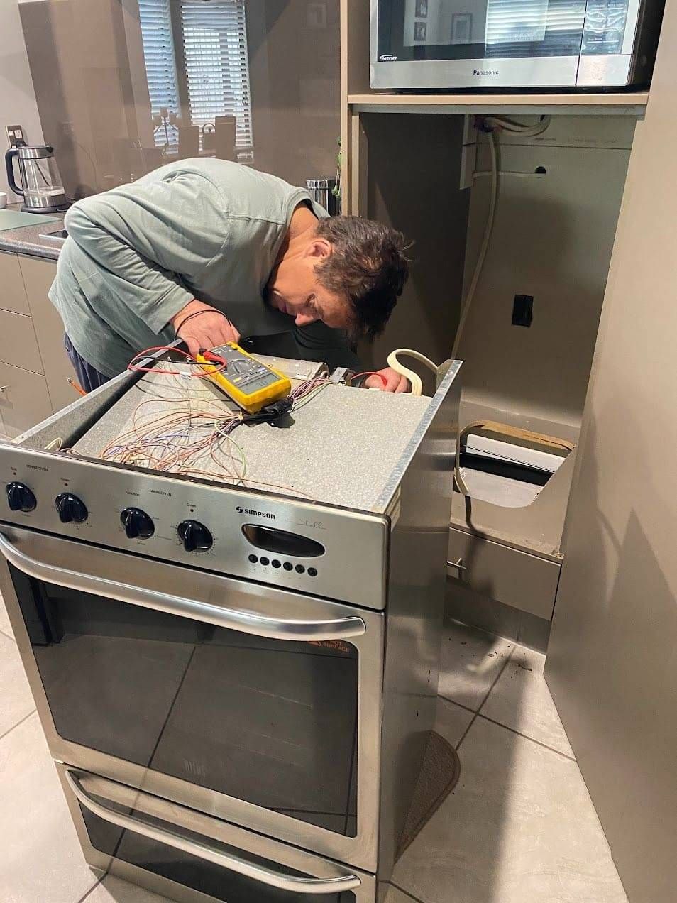 Grayson Dales Electrical fixing a oven