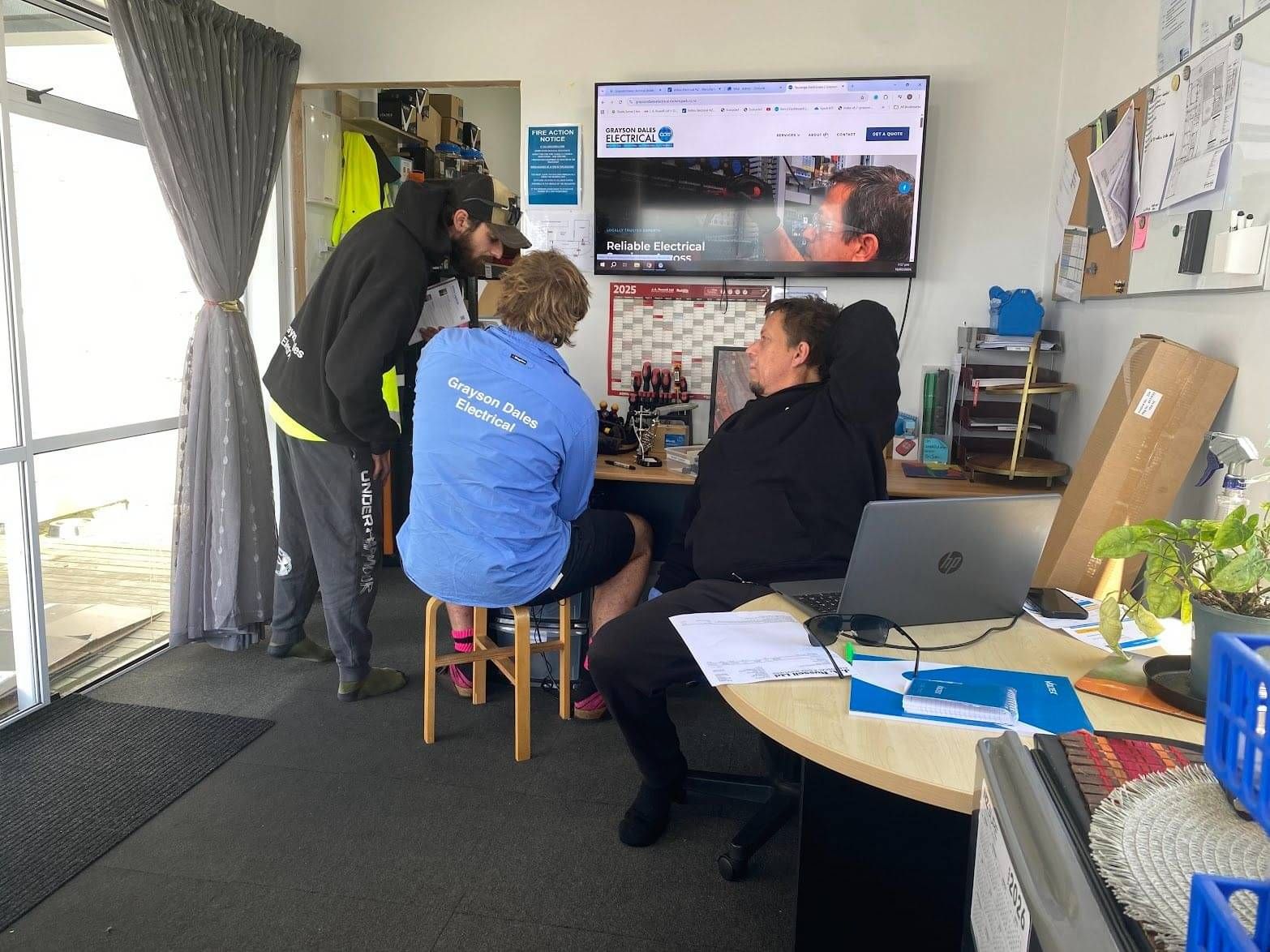 Grayson Dales and his team in the office