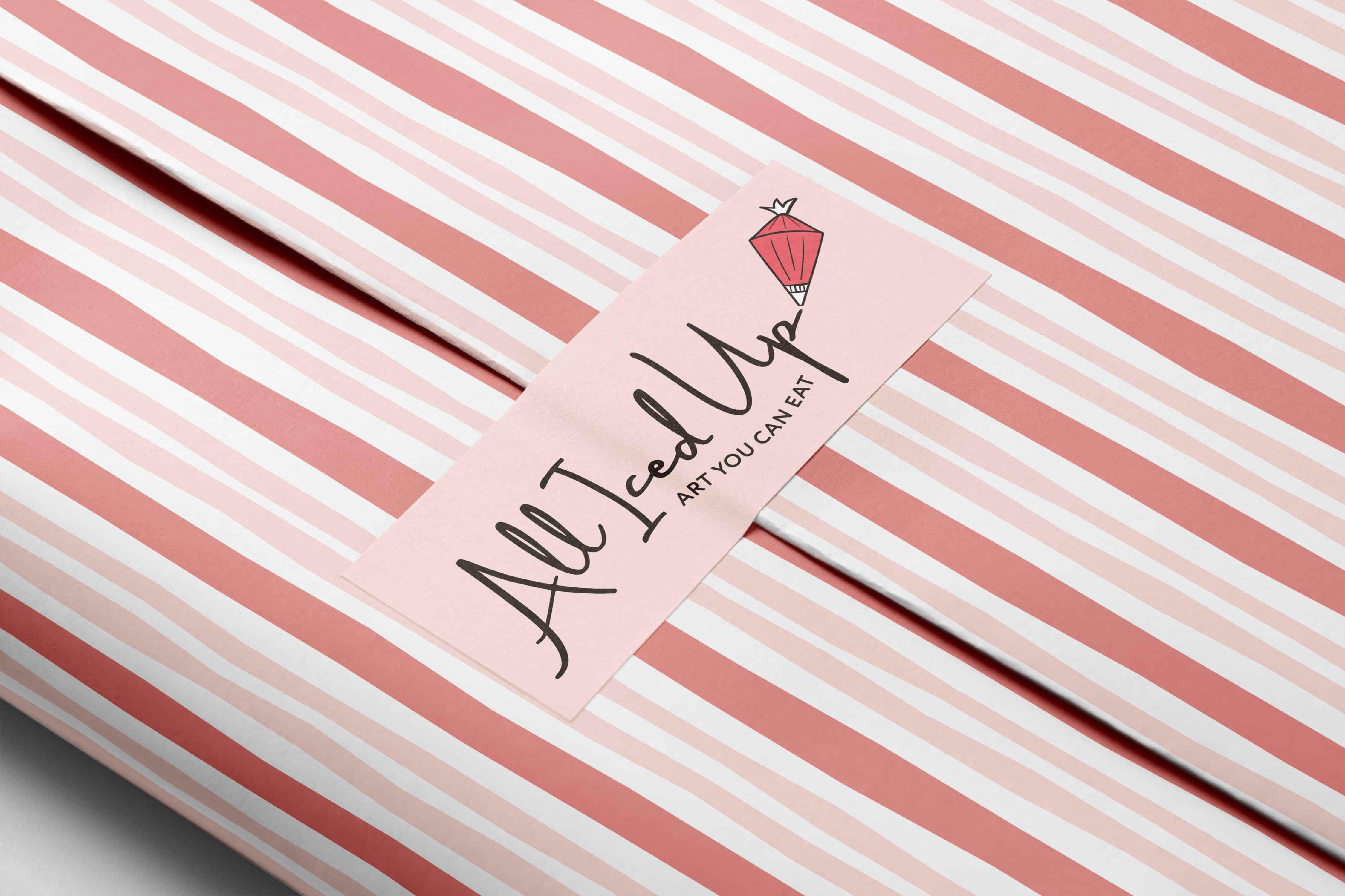 Image of All Iced Up’s pink logo. By Creative Box