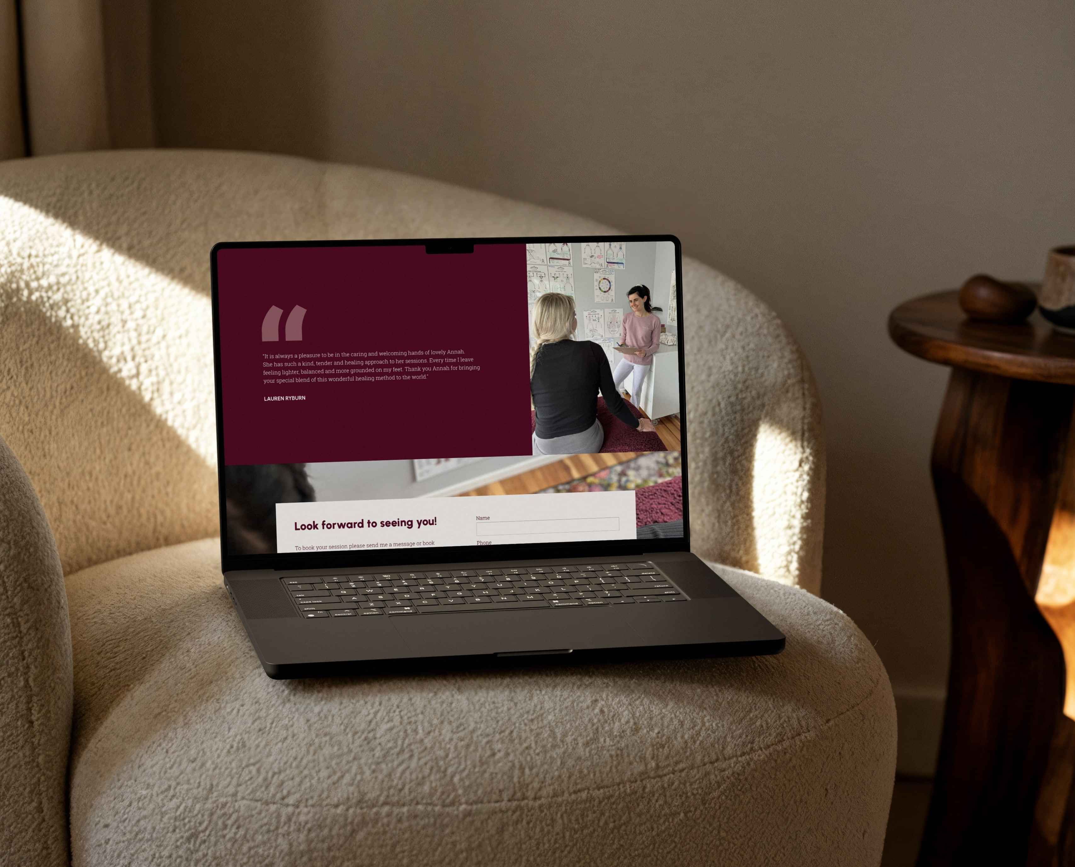 Image of ipad mockup with Annah Verheij’s website on a white couch. By Creative Box