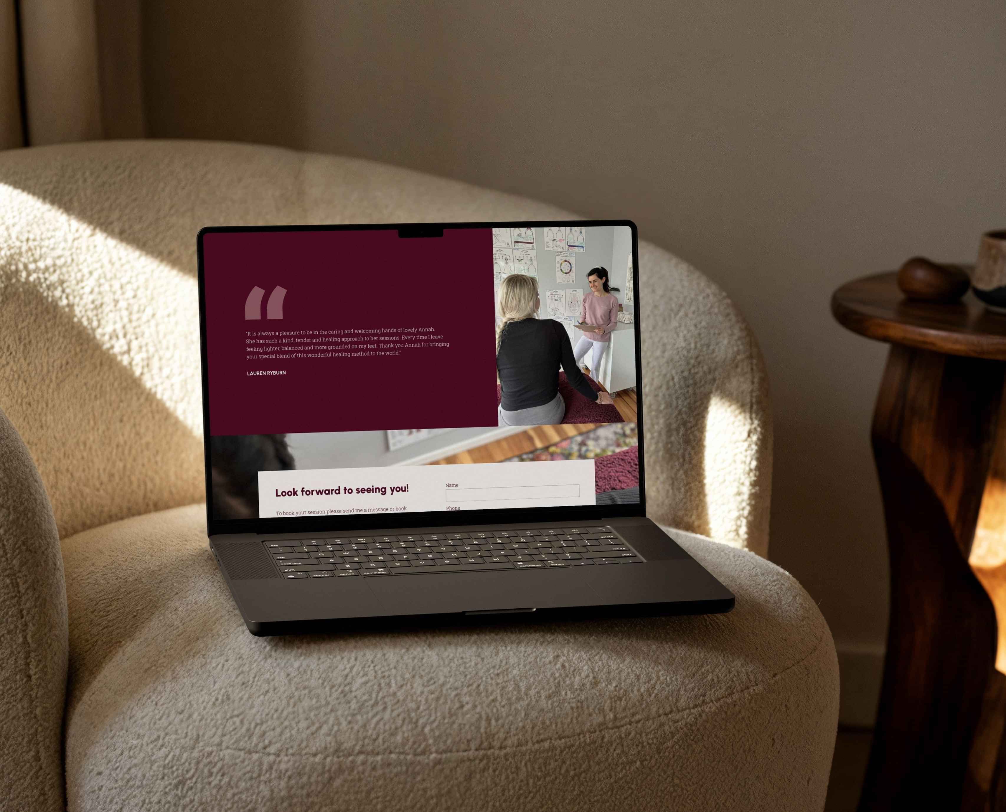 Image of ipad mockup with Annah Verheij’s website on a white couch. By Creative Box