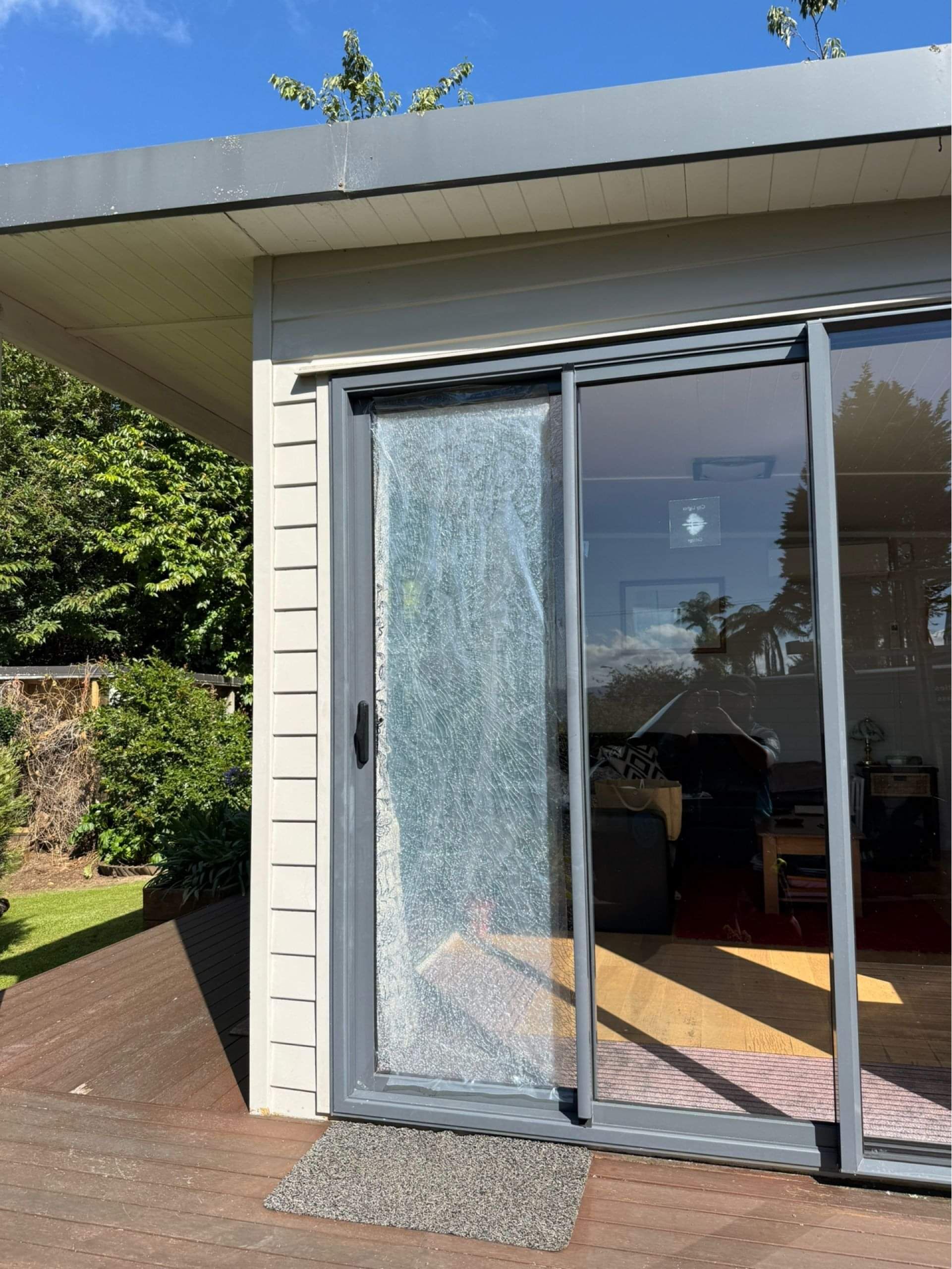 Broken glass window in a ranch slider door