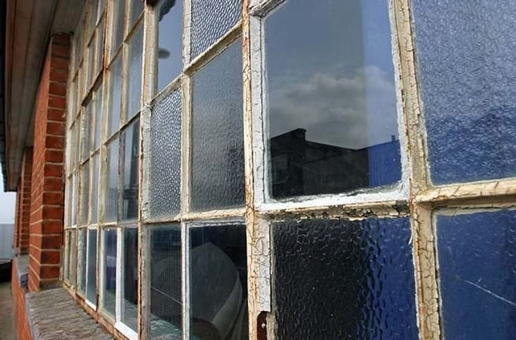 Old cracked paint on window frames
