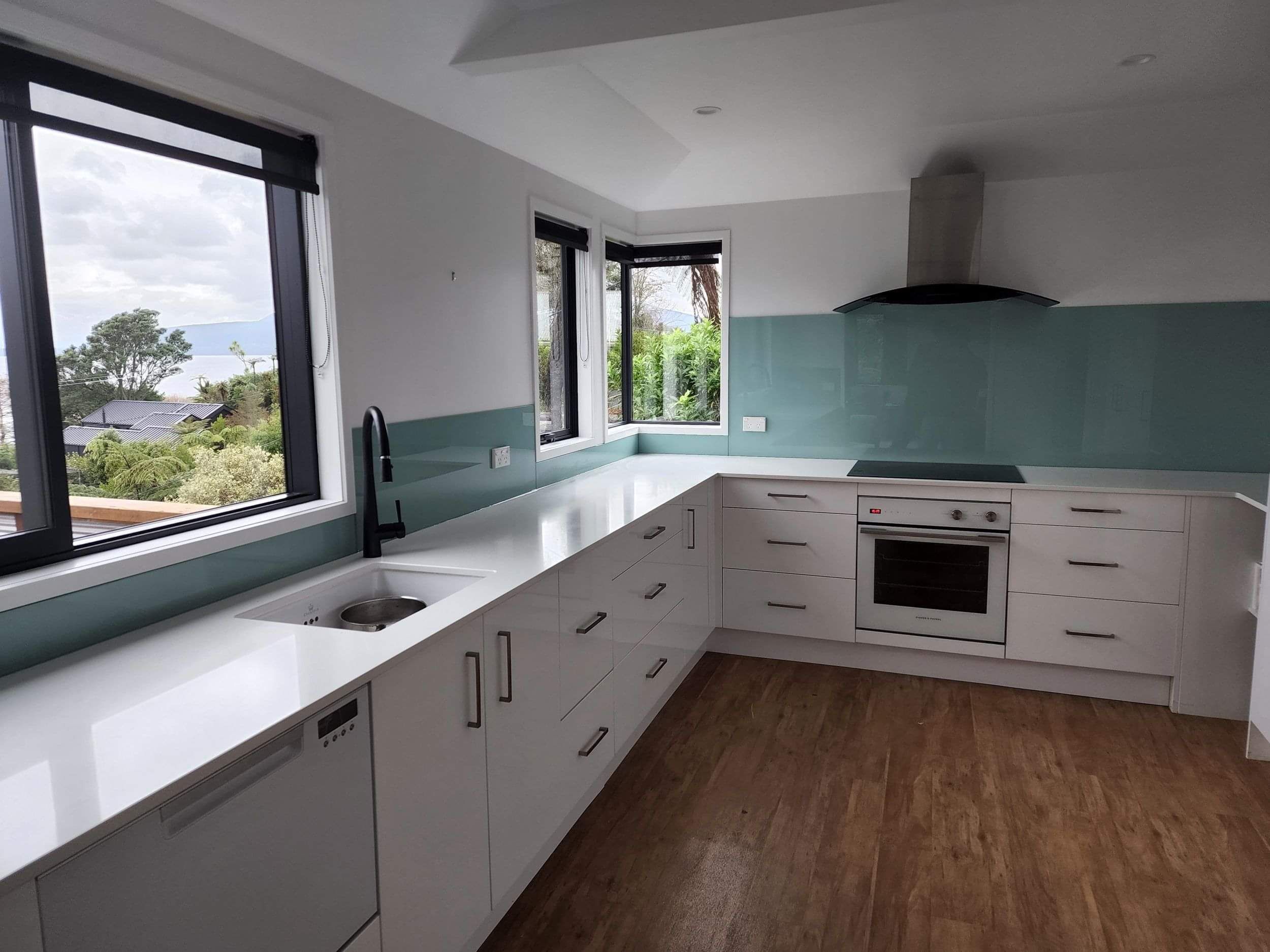 Tracey's cloud splashback in a white kitchen