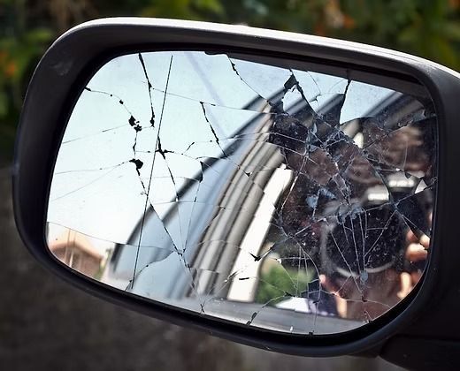 Cracked side mirror of a car